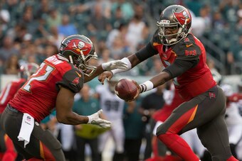 PHILADELPHIA, PA - AUGUST 11: Jameis Winston #3 hands the ball off to Doug Martin #22 of the Tampa Bay Buccaneers against the Philadelphia Eagles at Lincoln Financial Field on August 11, 2016 in Philadelphia, Pennsylvania. The Eagles defeated the Buccanee
