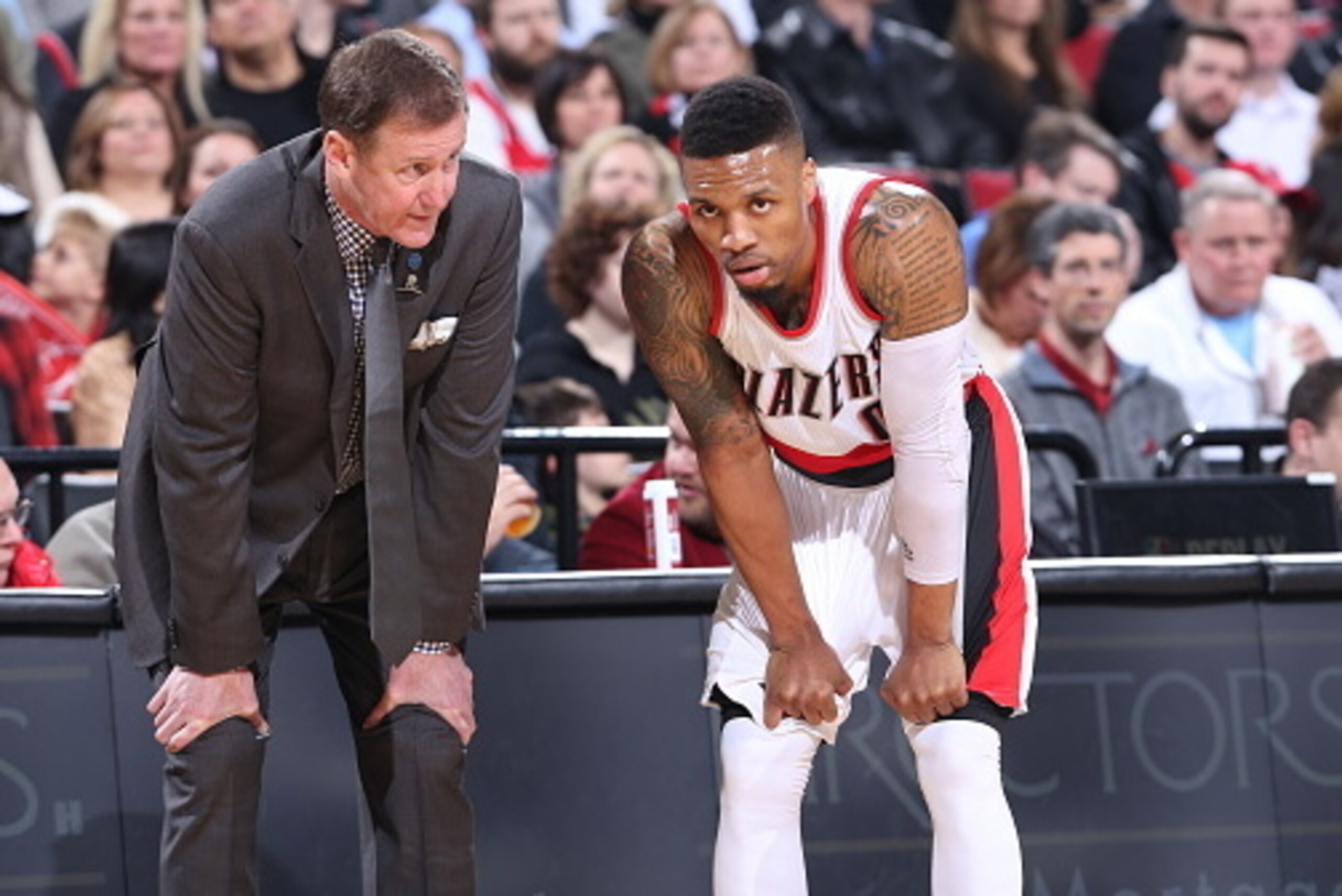 PORTLAND, OR - MARCH 23:  Head Coach Terry Stotts of the Portland Trail Blazers and Damian Lillard #0 of the Portland Trail Blazers looks on during the game against the Dallas Mavericks on March 23, 2016 at the Moda Center in Portland, Oregon. NOTE TO USE