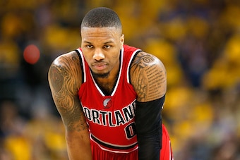 OAKLAND, CA - MAY 11:  Damian Lillard #0 of the Portland Trail Blazers stands on the court during their loss to the Golden State Warriors in Game Five of the Western Conference Semifinals during the 2016 NBA Playoffs on May 11, 2016 at Oracle Arena in Oak
