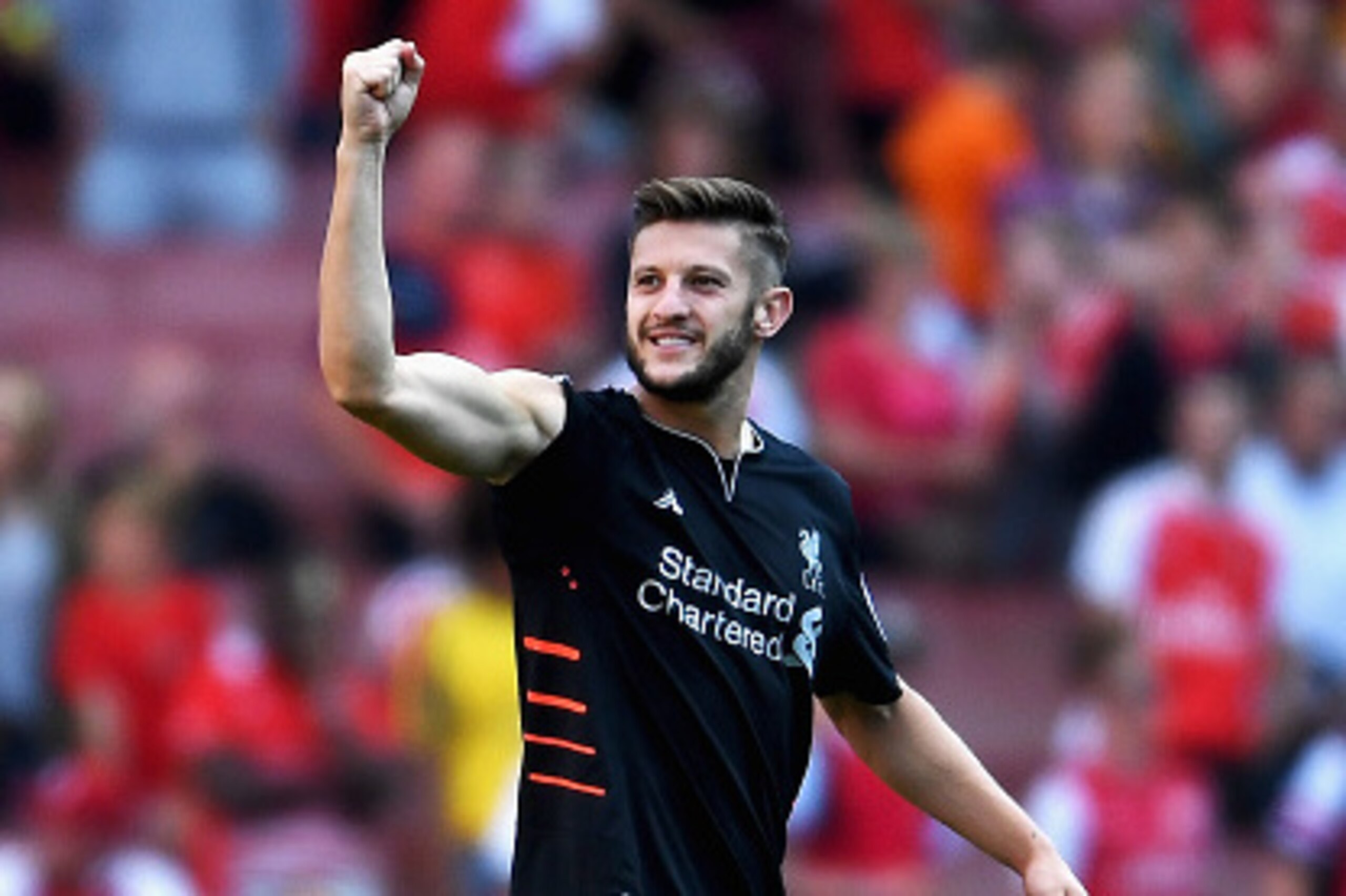 LONDON, ENGLAND - AUGUST 14: Adam Lallana of Liverpool celebrates after the Premier League match between Arsenal and Liverpool at Emirates Stadium on August 14, 2016 in London, England.  (Photo by Mike Hewitt/Getty Images)