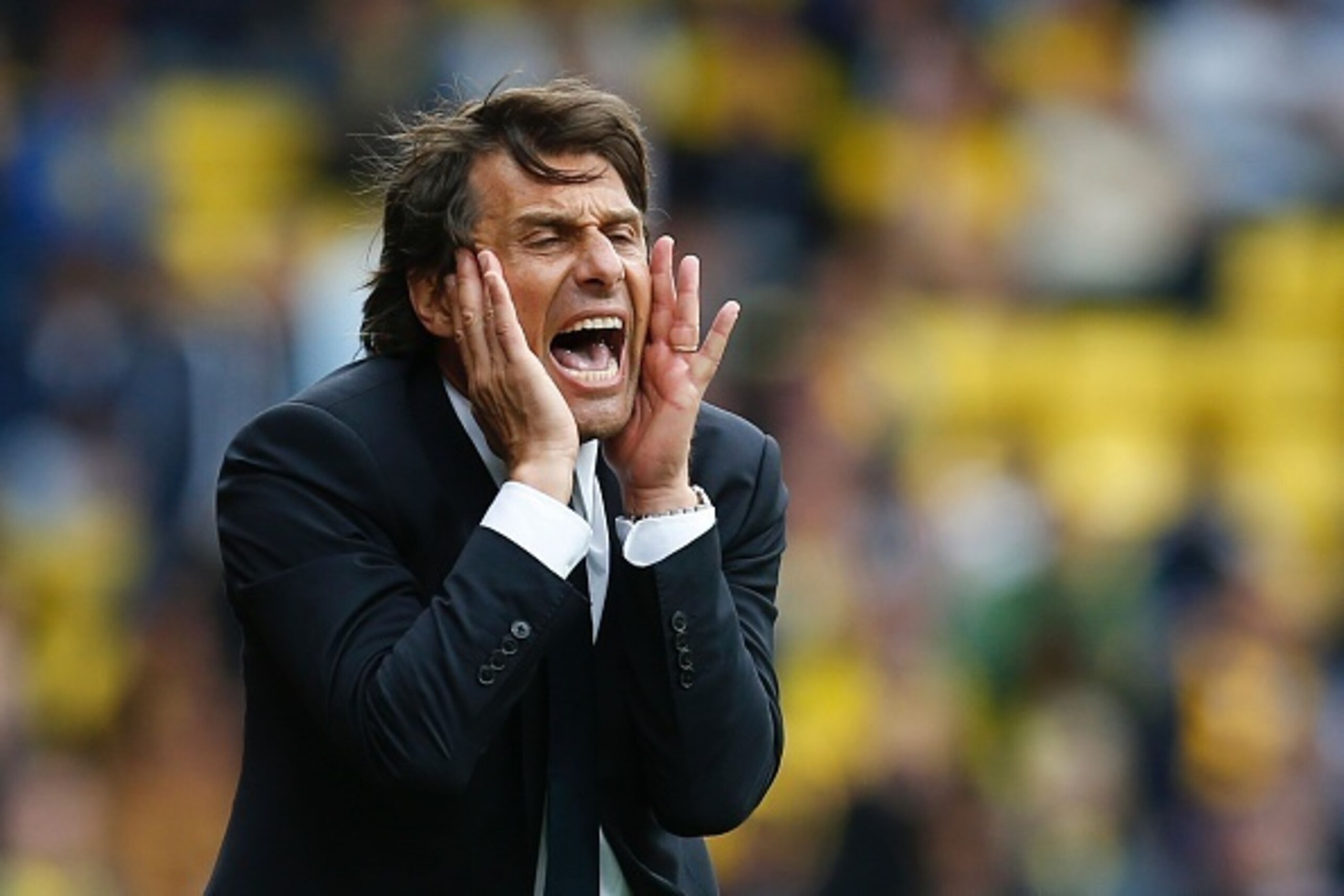 Chelsea's Italian head coach Antonio Conte reacts on the touchline during the English Premier League football match between Watford and Chelsea at Vicarage Road Stadium in Watford, north of London on August 20, 2016. / AFP / Ian Kington / RESTRICTED TO ED