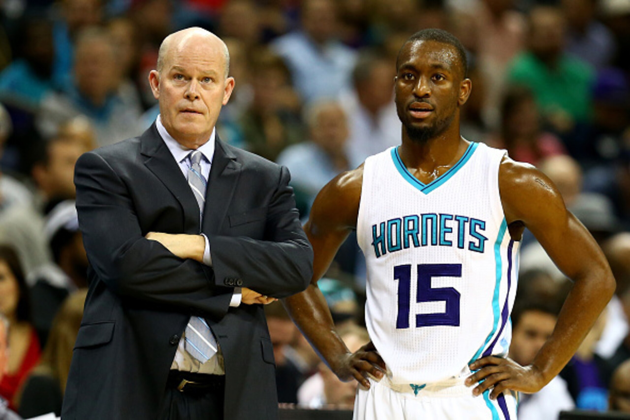 CHARLOTTE, NC - NOVEMBER 24: Head coach Steve Clifford of the Charlotte Hornets talks to Kemba Walker #15 during their game at Time Warner Cable Arena on November 24, 2014 in Charlotte, North Carolina.
NOTE TO USER: User expressly acknowledges and agrees CHARLOTTE, NC - NOVEMBER 24: Head coach Steve Clifford of the Charlotte Hornets talks to Kemba Walker #15 during their game at Time Warner Cable Arena on November 24, 2014 in Charlotte, North Carolina.
NOTE TO USER: User expressly acknowledges and agrees