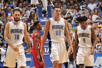 ORLANDO, FL - DECEMBER 28:  Evan Fournier #10 of the Orlando Magic, Aaron Gordon #00 of the Orlando Magic, and Elfrid Payton #4 of the Orlando Magic during the game against the New Orleans Pelicans on December 28, 2015 at Amway Center in Orlando, Florida.