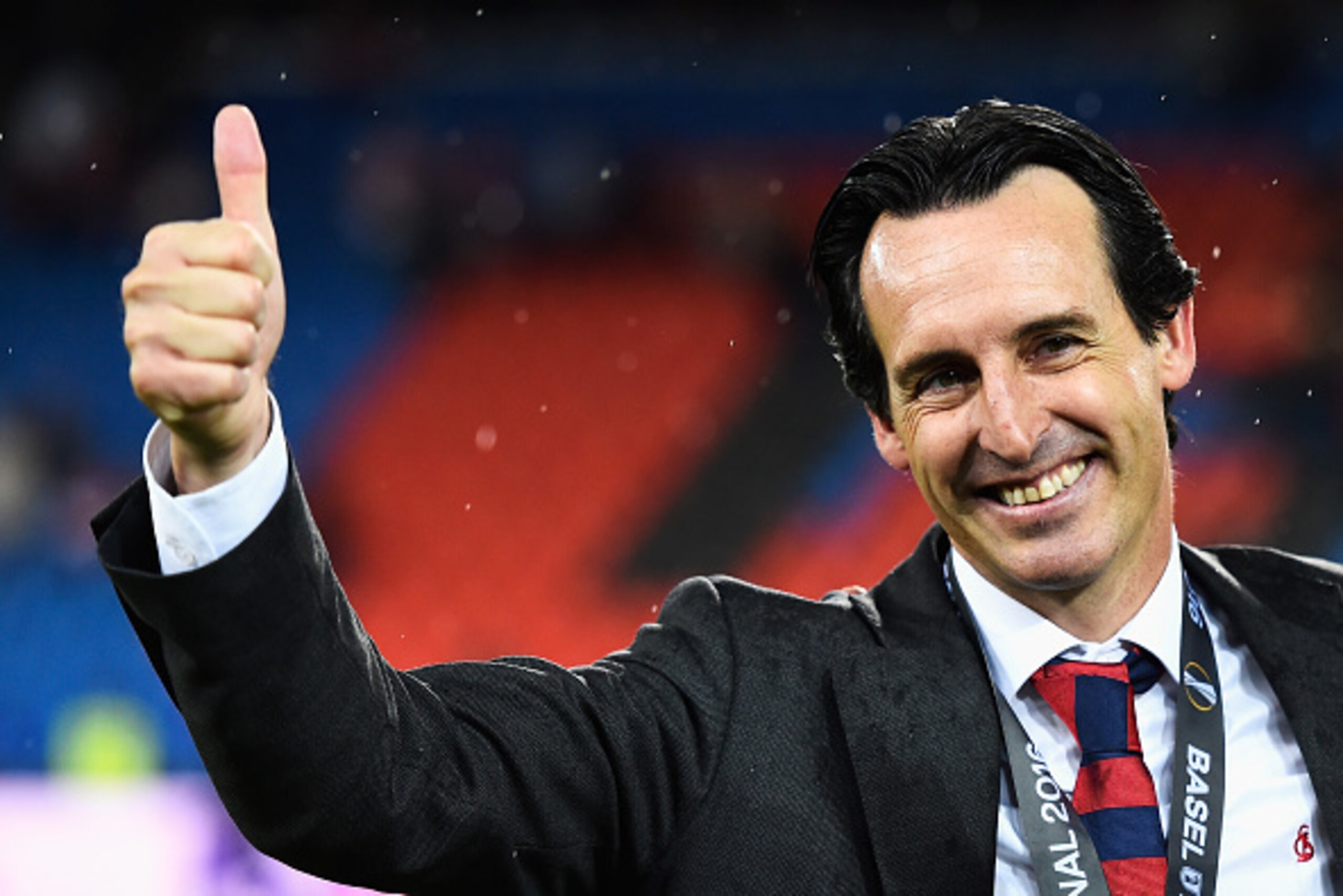 BASEL, SWITZERLAND - MAY 18:  Unai Emery manager of Sevilla celebrates the Europa League champions after the award ceremoy of the UEFA Europa League Final match between Liverpool and Sevilla at St. Jakob-Park on May 18, 2016 in Basel, Switzerland.  (Photo