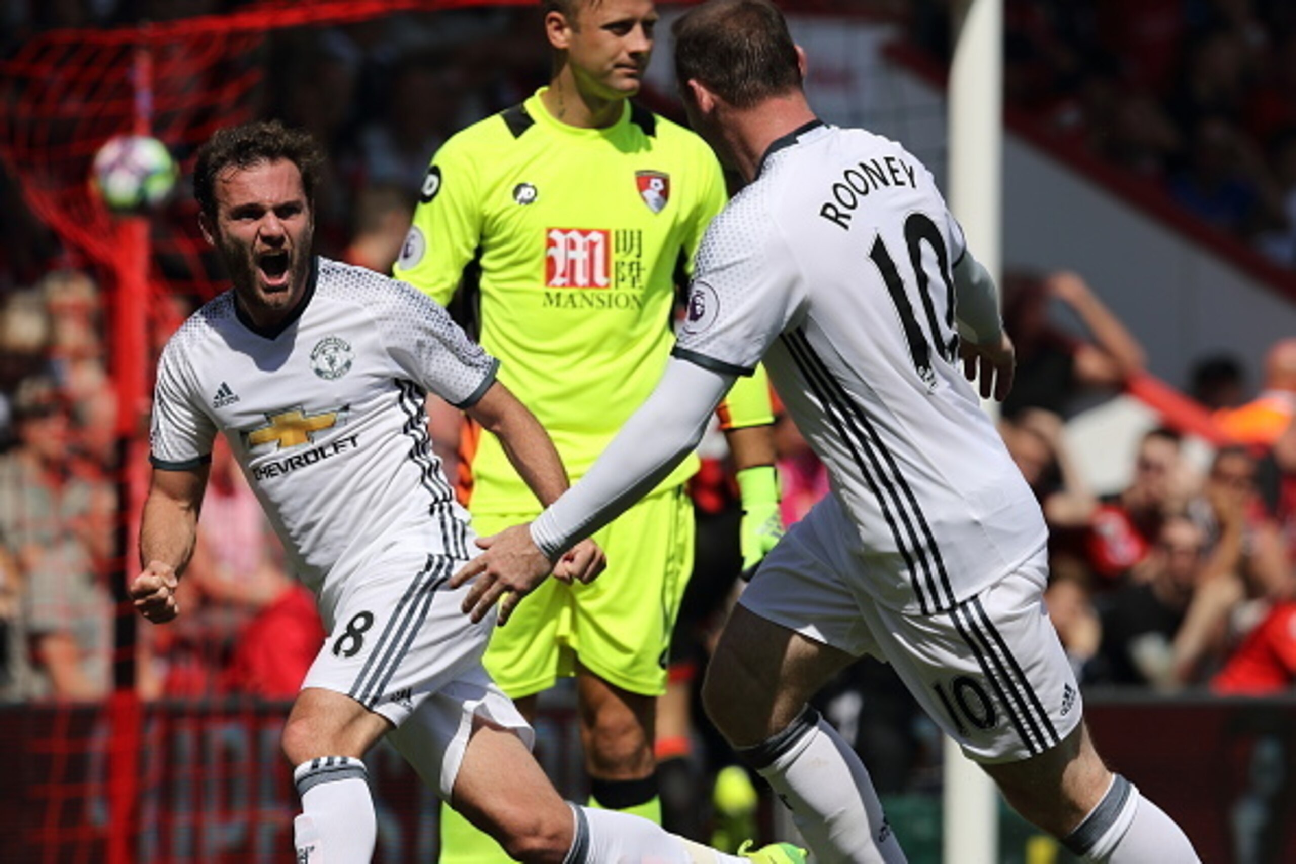 BOURNEMOUTH, ENGLAND - AUGUST 14: Juan Mata of Manchester Untied celebrates after scoring a goal to make it 0- 1 during the Premier League match between AFC Bournemouth and  Manchester United at Vitality Stadium on August 14, 2016 in Bournemouth, England.