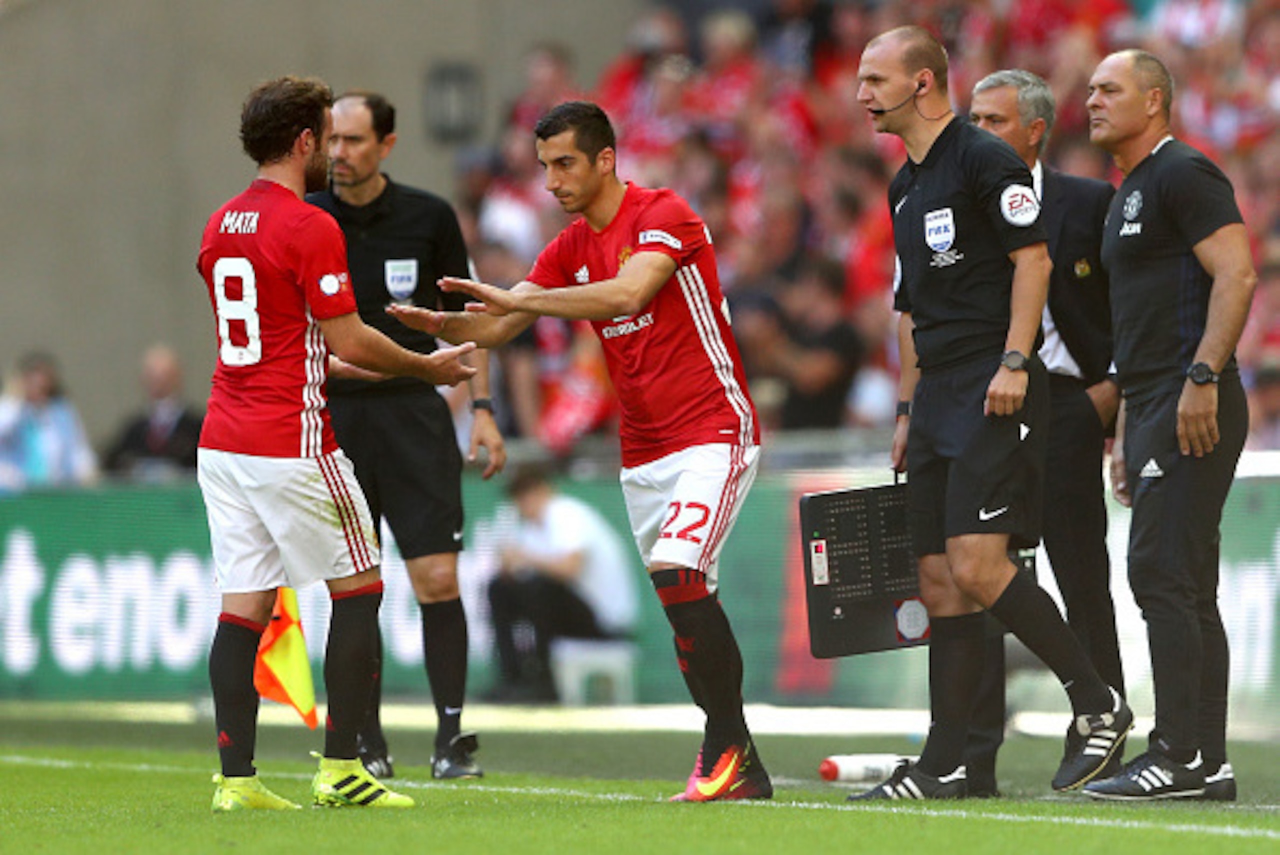 LONDON, ENGLAND - AUGUST 07: Juan Mata of Manchester United is subbed off for Henrikh Mkhitaryan of Manchester United during The FA Community Shield match between Leicester City and Manchester United at Wembley Stadium on August 7, 2016 in London, England