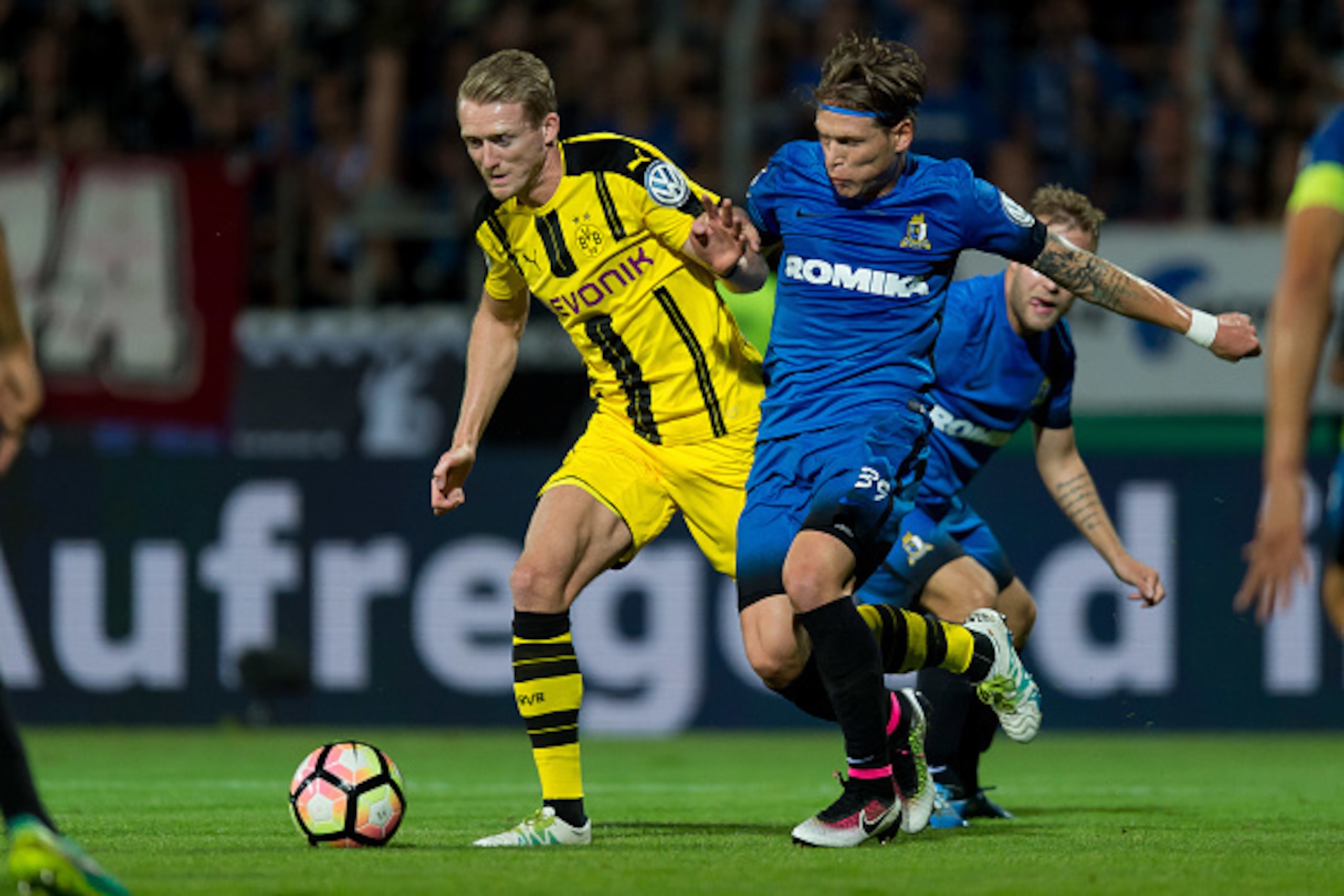 Trier, Germany 22.08.2016, DFB-Pokal 1. Runde, SV Eintracht Tier 05 - BV Borussia Dortmund,  Andre Schuerrle (BVB) gegen Florian Riedel (SVT)  (Photo by TF-Images/Getty Images)