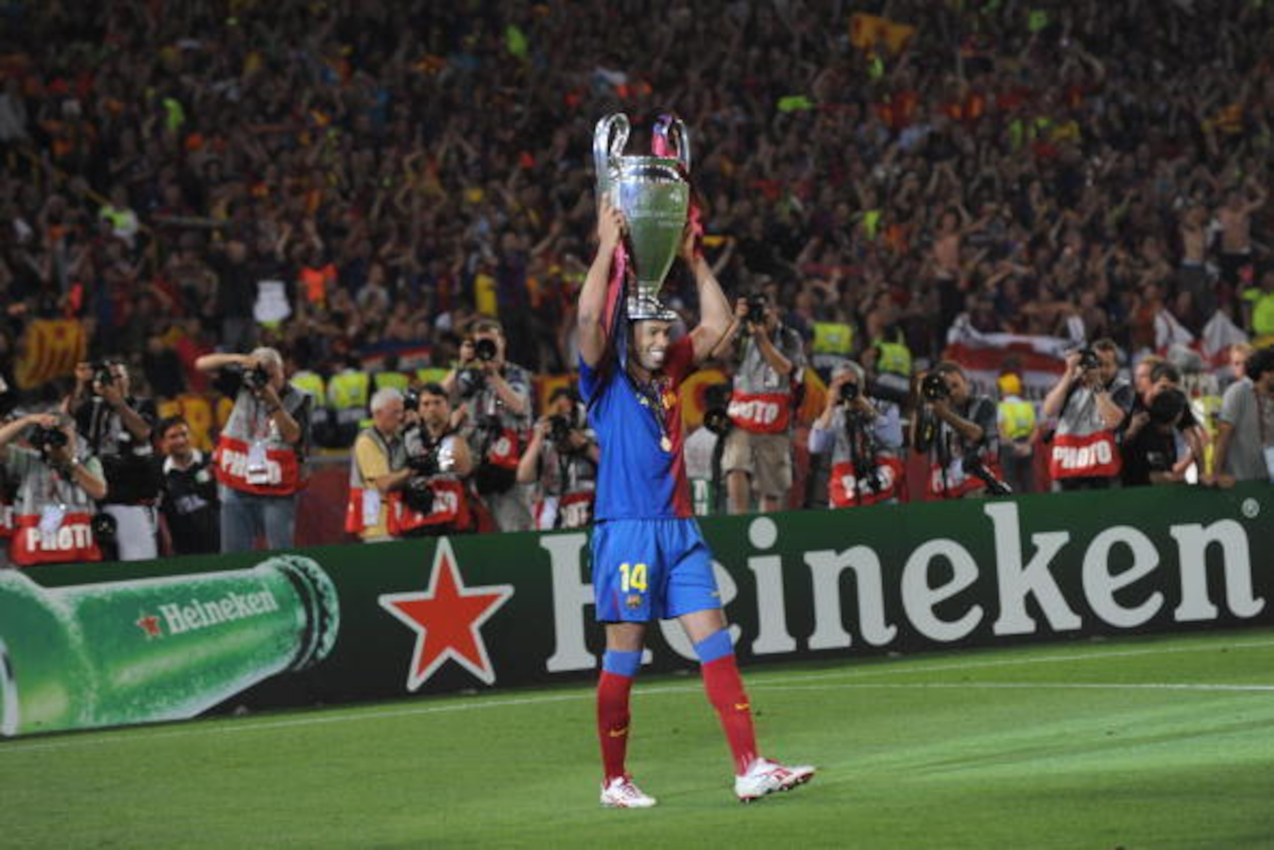 Barcelona´s French forward Thierry Henry celebrates with the Champions League Cup after the trophy ceremony on May 27, 2009 at the Olympic Stadium in Rome. Barcelona defeated  Manchester United 2-0 in the final of the UEFA football Champions League.      