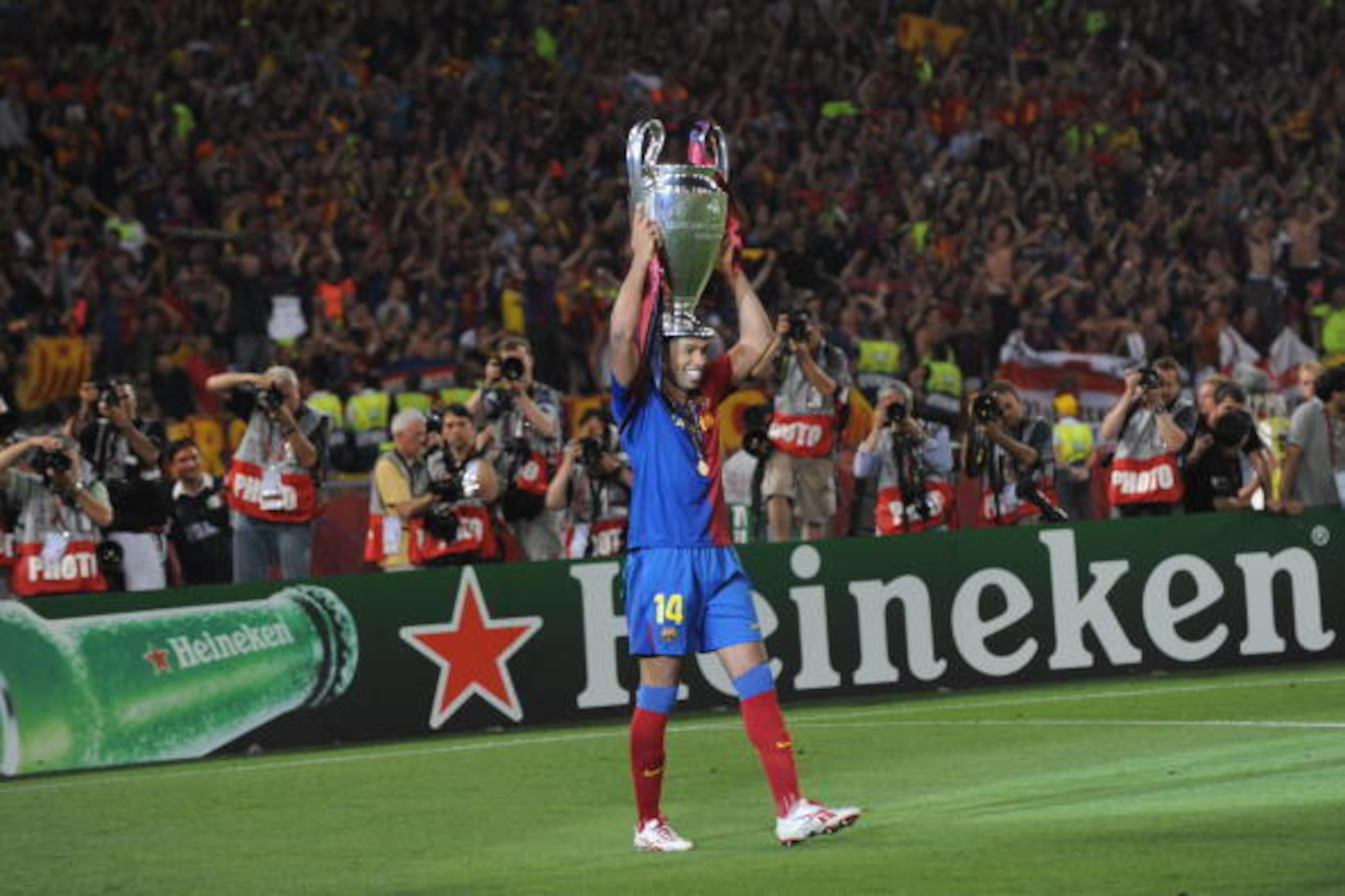 Barcelona´s French forward Thierry Henry celebrates with the Champions League Cup after the trophy ceremony on May 27, 2009 at the Olympic Stadium in Rome. Barcelona defeated  Manchester United 2-0 in the final of the UEFA football Champions League.      