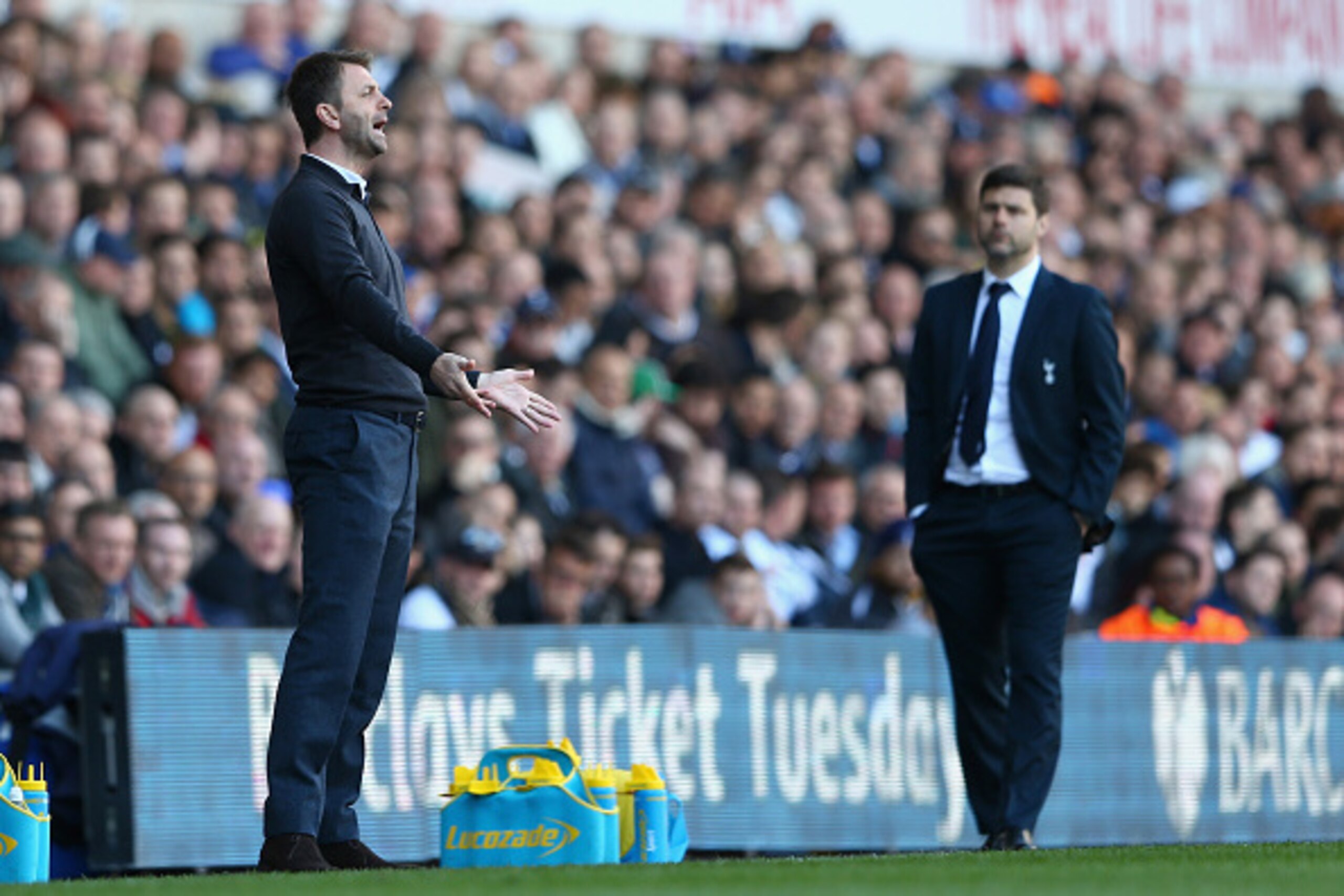 LONDON, ENGLAND - APRIL 11: Manager Tim Sherwood of Aston Villa instructs as Mauricio Pochettino ot Spurs looks on during the Barclays Premier League match between Tottenham Hotspur and Aston Villa at White Hart Lane on April 11, 2015 in London, England LONDON, ENGLAND - APRIL 11: Manager Tim Sherwood of Aston Villa instructs as Mauricio Pochettino ot Spurs looks on during the Barclays Premier League match between Tottenham Hotspur and Aston Villa at White Hart Lane on April 11, 2015 in London, England