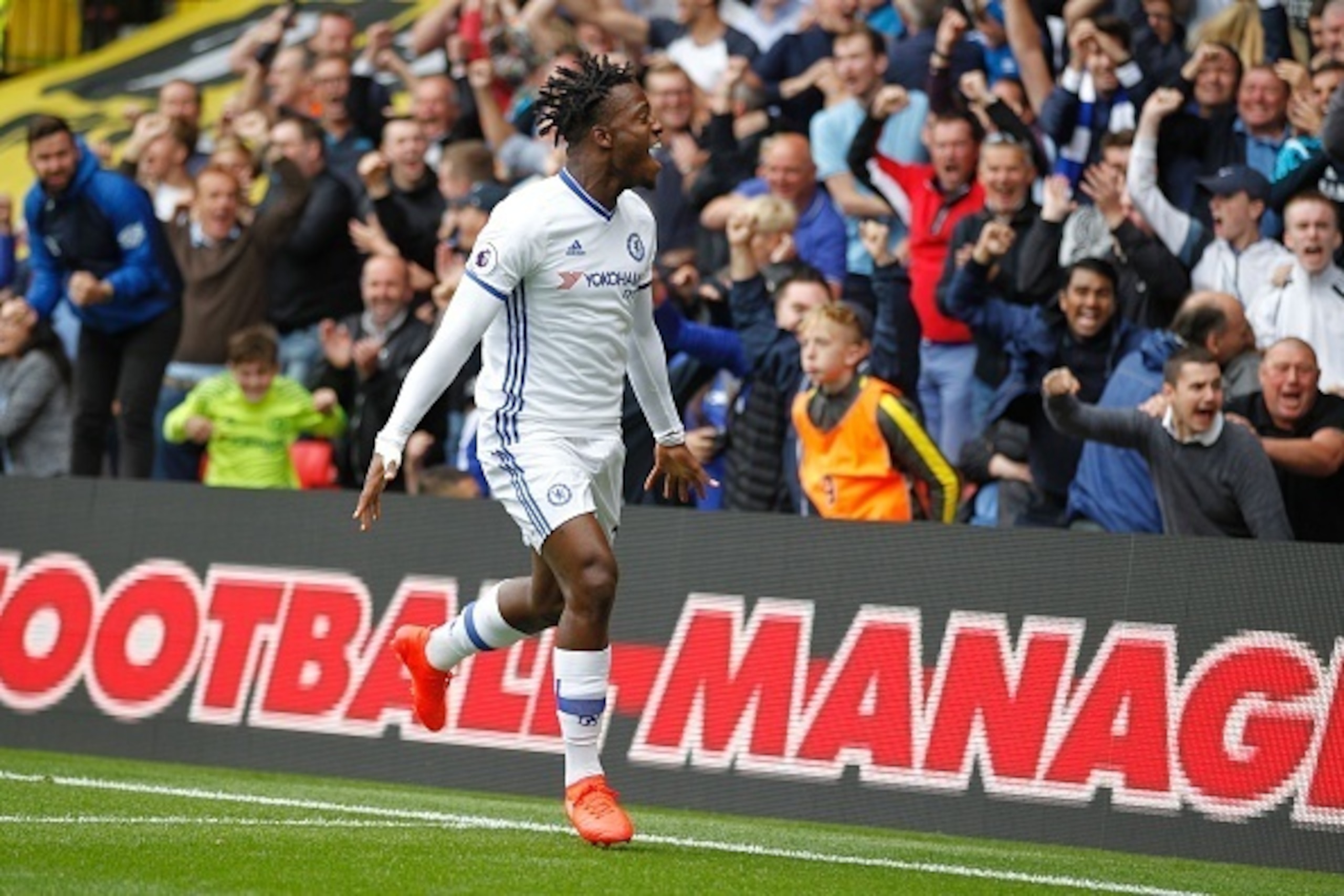 Chelsea's Belgian striker Michy Batshuayi celebrates scoring an equalising goal to make the score 1-1 during the English Premier League football match between Watford and Chelsea at Vicarage Road Stadium in Watford, north of London on August 20, 2016. / A