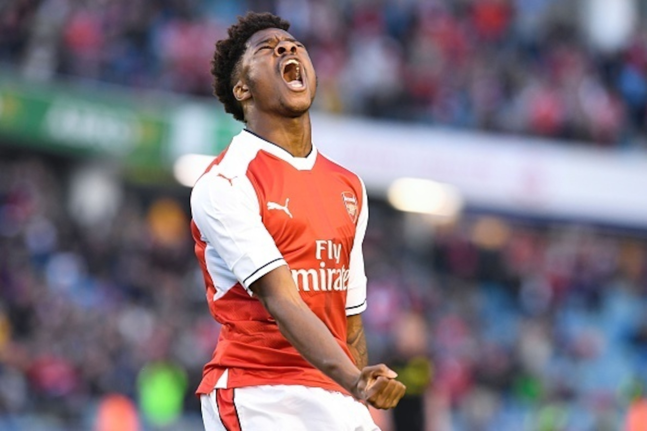 Arsenal's English forward Chuba Akpom celebrates after scoring during the friendly football match between Arsenal and Manchester City at the Ullevi stadium in Gothenburg on August 7, 2016. / AFP / JONATHAN NACKSTRAND        (Photo credit should read JONAT