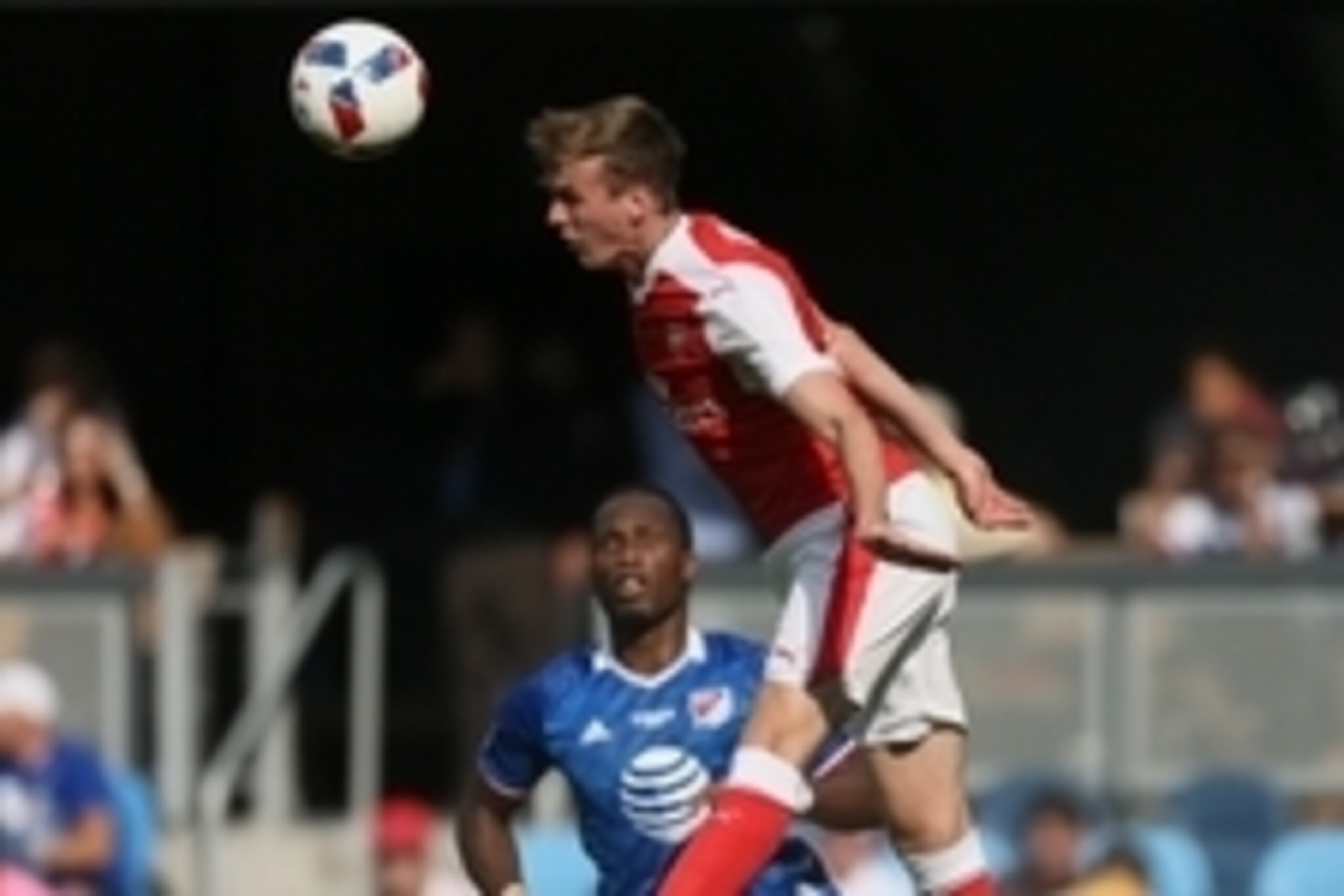 Jul 28, 2016; San Jose, CA, USA; Arsenal defender Rob Holding (16) goes for a header ahead of MLS All-Star Team forward Didier Drogba (11) during the MLS All-Star game between the MLS All-Star Team and Arsenal at Avaya Stadium. Mandatory Credit: John Heft