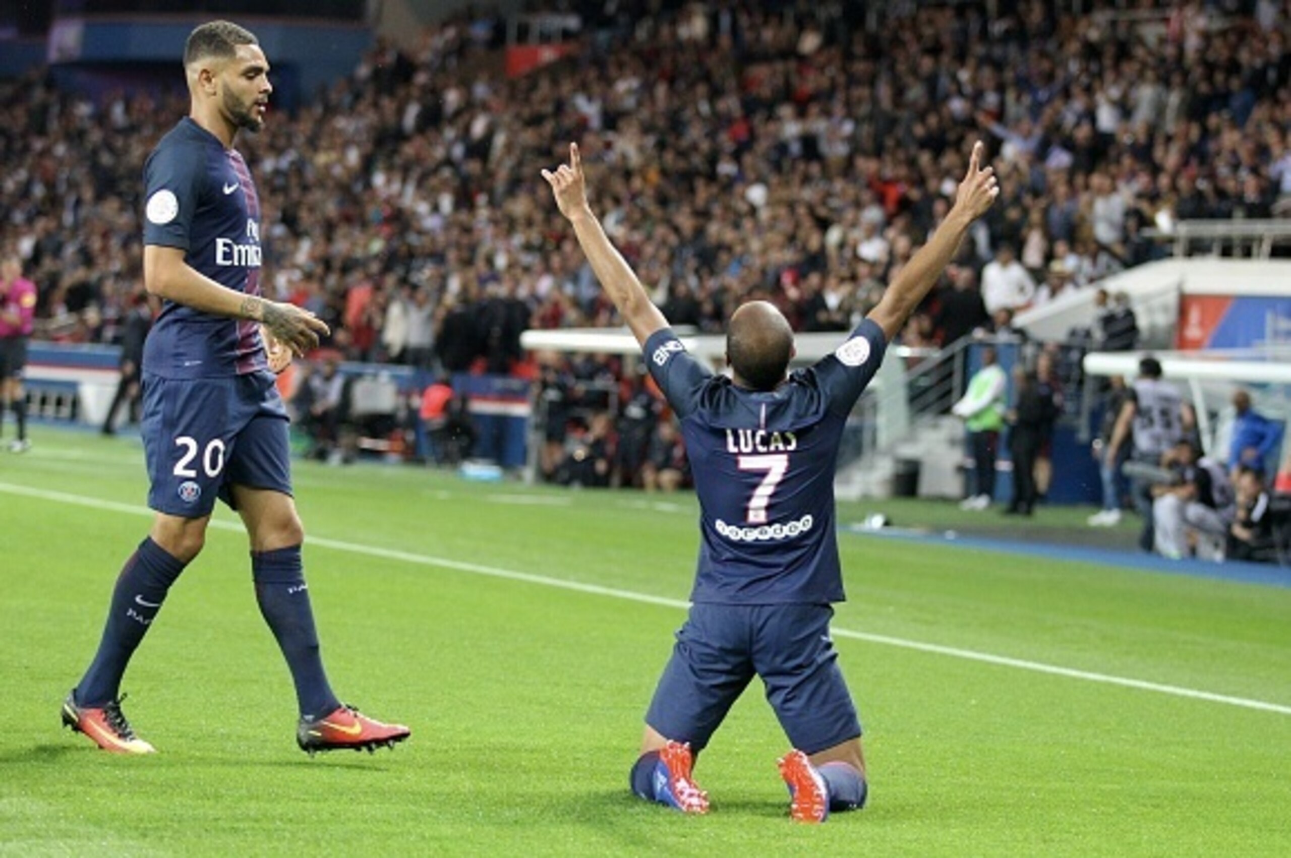 PARIS, FRANCE - AUGUST 21:  Lucas Moura of Paris Saint-Germain celebrate his goal with Layvin Kurzawa (L) during the French Ligue 1 match between Paris Saint-Germain and FC Metz at Parc des Princes on August 21, 2016 in Paris, France.  (Photo by Xavier La
