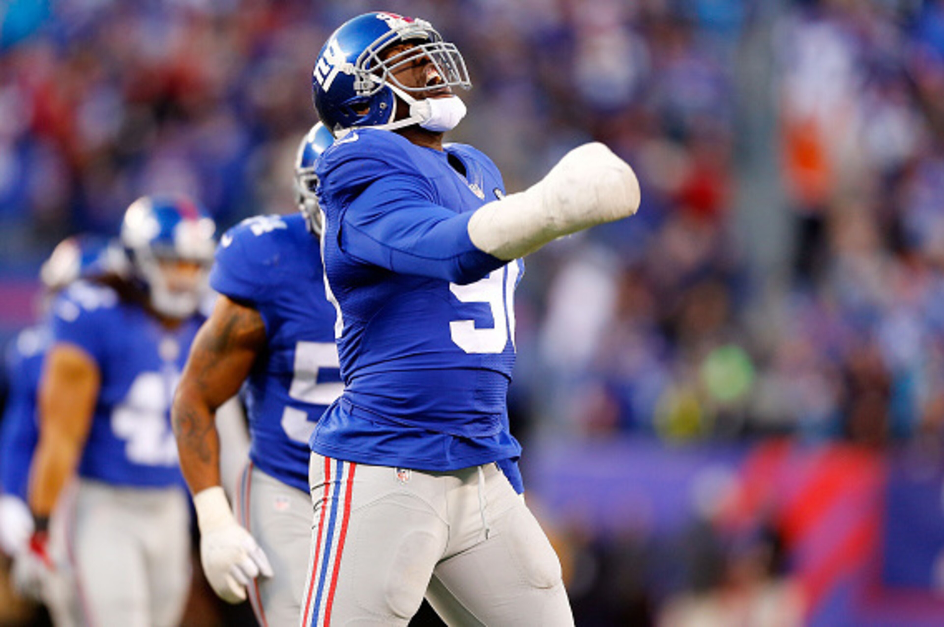 EAST RUTHERFORD, NJ - DECEMBER 20:  (NEW YORK DAILIES OUT)    Jason Pierre-Paul #90 of the New York Giants in action against the Carolina Panthers on December 20, 2015 at MetLife Stadium in East Rutherford, New Jersey. The Panthers defeated the Giants 38-