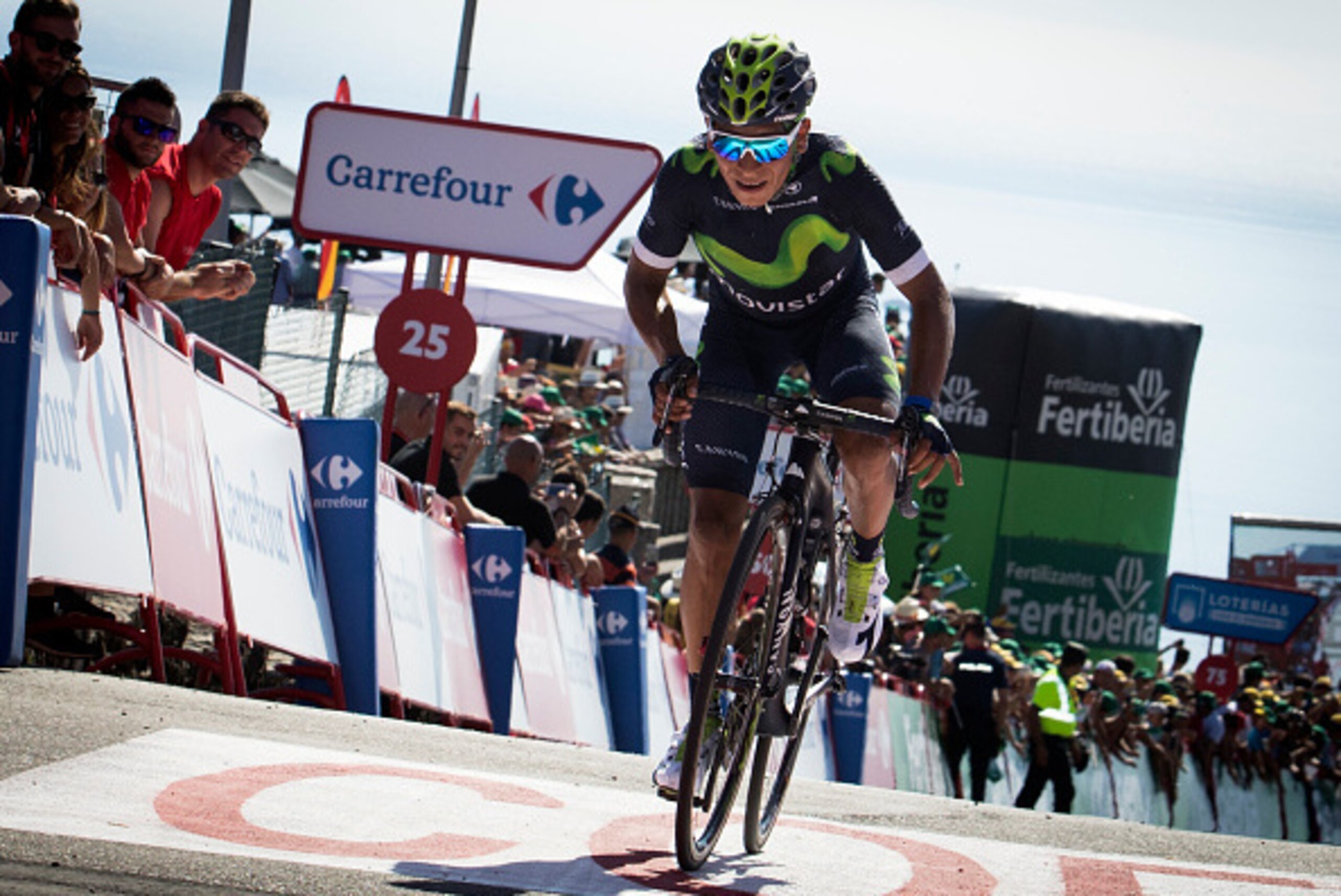 Movistar's Colombian cyclist Nairo Quintana crosses the finish line during the third stage of the 71st edition of 'La Vuelta' Tour of Spain, a 170 km route between Marin (Pontevedra) and Mirador Ezaro on August 22, 2016. / AFP / JAIME REINA        (Photo 