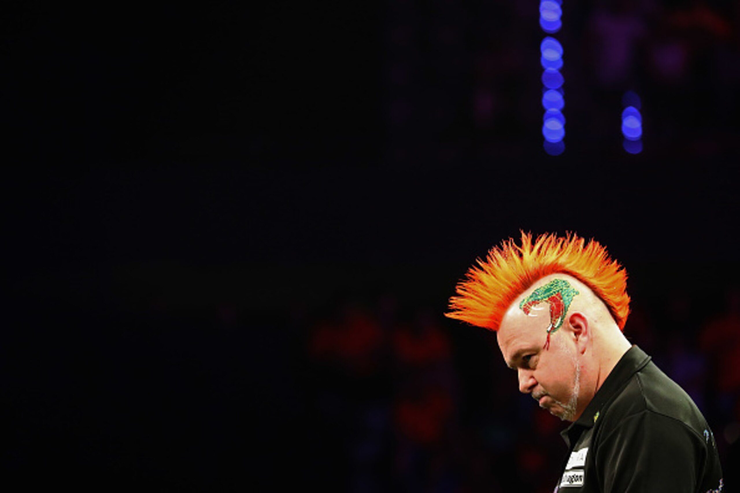 ROTTERDAM, NETHERLANDS - MAY 12:  Peter Wright of Scotland looks on as he plays Raymond van Barneveld of the Netherlands during the Darts Betway Premier League Night 15 at Rotterdam Ahoy on May 12, 2016 in Rotterdam, .  (Photo by Dean Mouhtaropoulos/Getty