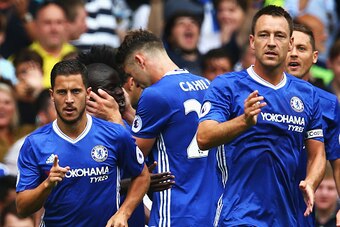 LONDON, ENGLAND - AUGUST 27:  Eden Hazard of Chelsea celebrates scoring his sides first goal with team mates during the Premier League match between Chelsea and Burnley at Stamford Bridge on August 27, 2016 in London, England.  (Photo by Steve Bardens/Get