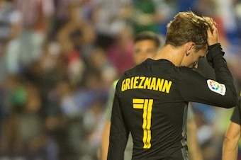 Atletico Madrid's French forward Antoine Griezmann gestures after during the Spanish league football match Club Deportivo Leganes SAD vs Club Atletico de Madrid at the Estadio Municipal Butarque in Leganes on the outskirts of Madrid on August 27, 2016. / 