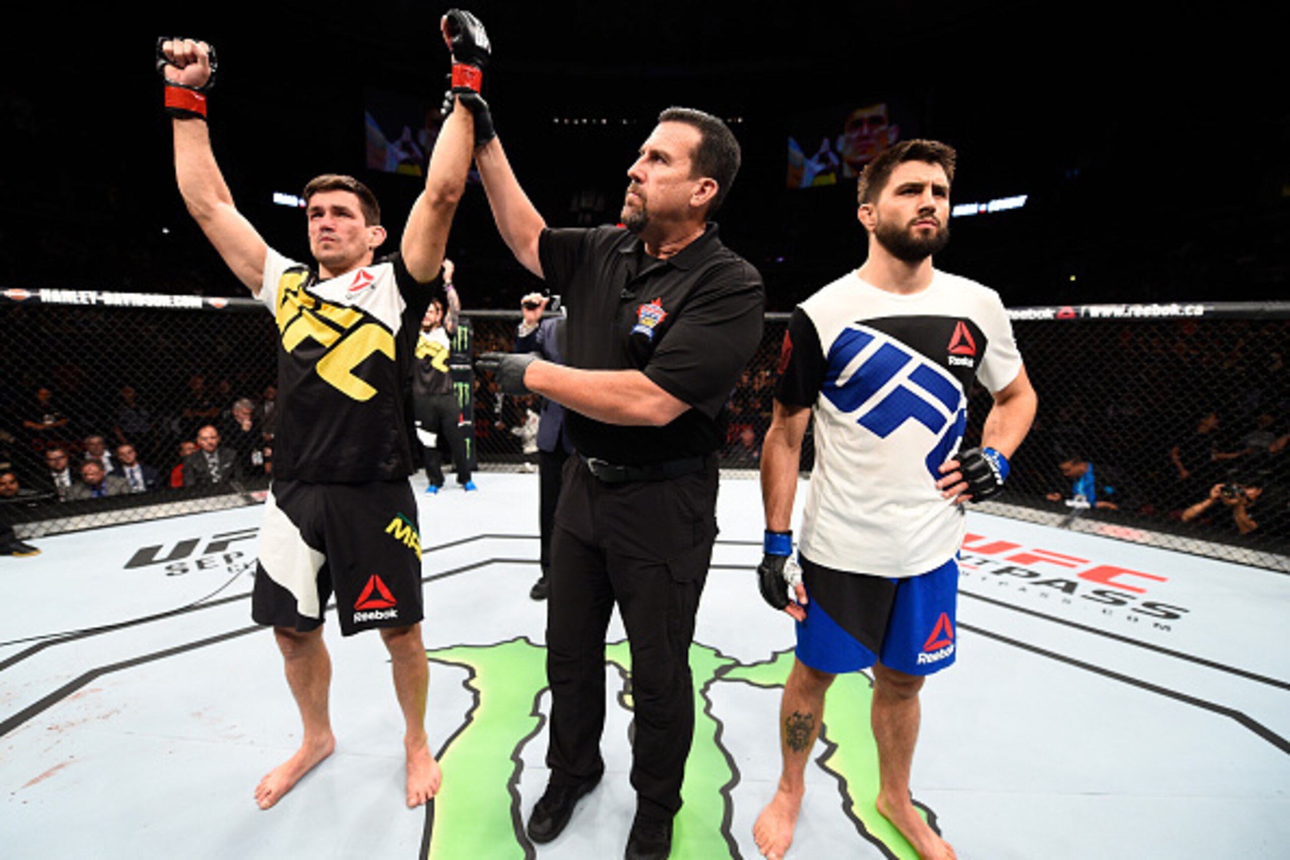 VANCOUVER, BC - AUGUST 27: (R-L) Demian Maia of Brazil celebrates his submission victory over Carlos Condit of the United States in their welterweight bout during the UFC Fight Night event at Rogers Arena on August 27, 2016 in Vancouver, British Columbia, VANCOUVER, BC - AUGUST 27: (R-L) Demian Maia of Brazil celebrates his submission victory over Carlos Condit of the United States in their welterweight bout during the UFC Fight Night event at Rogers Arena on August 27, 2016 in Vancouver, British Columbia,