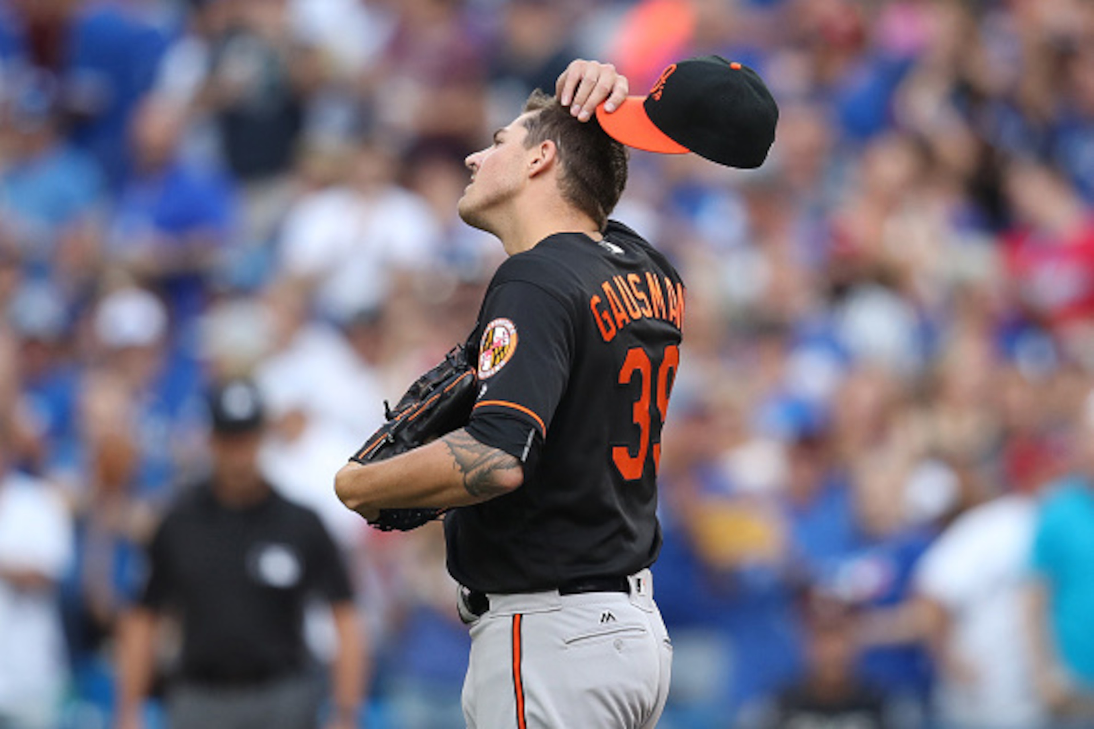 TORONTO, CANADA - JULY 29: Kevin Gausman #39 of the Baltimore Orioles reacts after giving up a solo home run to Edwin Encarnacion #10 of the Toronto Blue Jays in the first inning during MLB game action on July 29, 2016 at Rogers Centre in Toronto, Ontario TORONTO, CANADA - JULY 29: Kevin Gausman #39 of the Baltimore Orioles reacts after giving up a solo home run to Edwin Encarnacion #10 of the Toronto Blue Jays in the first inning during MLB game action on July 29, 2016 at Rogers Centre in Toronto, Ontario
