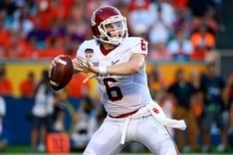 Dec 31, 2015; Miami Gardens, FL, USA; Oklahoma Sooners quarterback Baker Mayfield (6) throws a pass during the first half of the 2015 CFP semifinal against Clemson Tigers at the Orange Bowl at Sun Life Stadium.  Mandatory Credit: Steve Mitchell-USA TODAY 