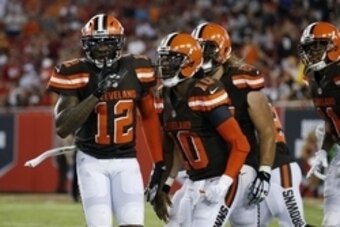 Aug 26, 2016; Tampa, FL, USA;  Cleveland Browns wide receiver Josh Gordon (12) celebrates with quarterback Robert Griffin III (10)  after he scored a touchdown against the Tampa Bay Buccaneers during the first half at Raymond James Stadium. Mandatory Cred