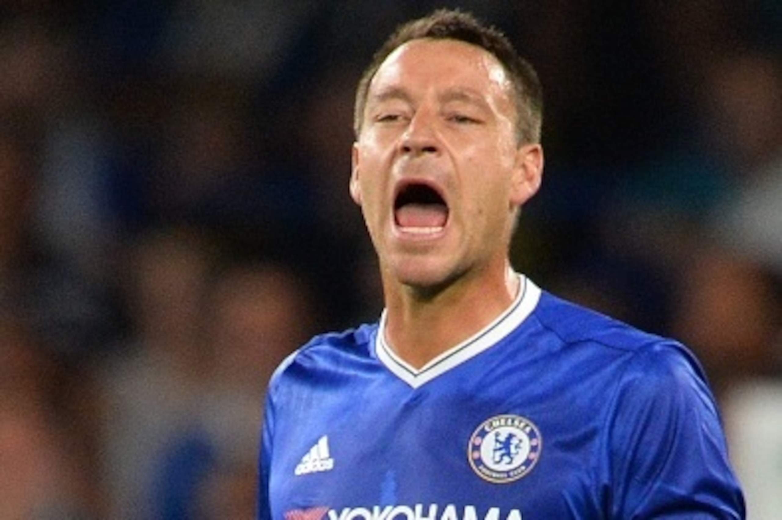 Chelsea's English defender John Terry shouts to his teammates during the English League Cup second round football match between Chelsea and Bristol Rovers at Stamford Bridge in London on August 23, 2016. / AFP / GLYN KIRK / RESTRICTED TO EDITORIAL USE. No