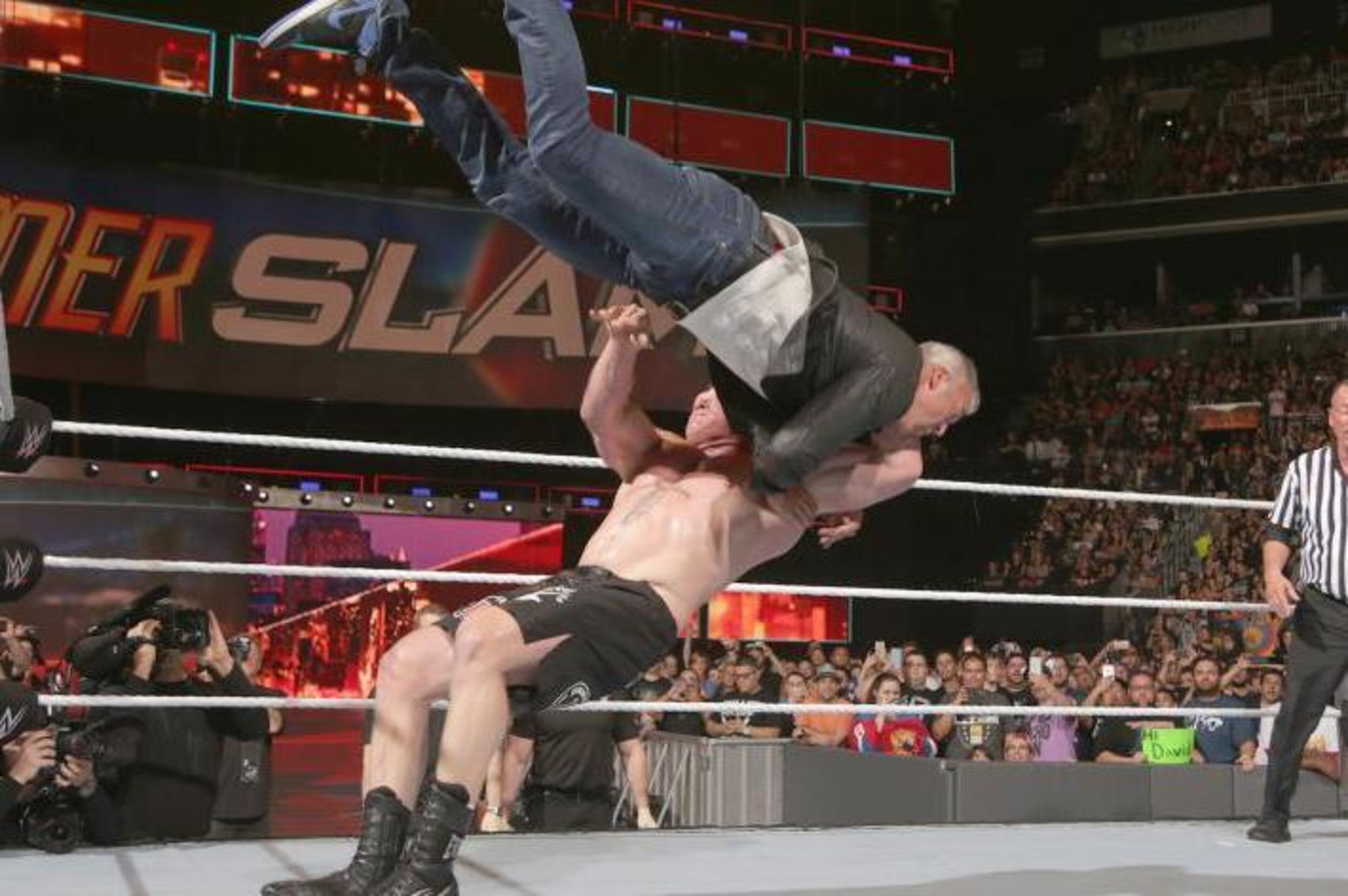 Brock Lesnar sends Shane McMahon on a painful ride.