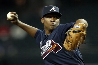 PHOENIX, AZ - MAY 18:  Starting pitcher Julio Teheran #43 of the Atlanta Braves pitches against the Arizona Diamondbacks during the Major League Baseball game at Chase Field on May 18, 2011 in Phoenix, Arizona.  (Photo by Christian Petersen/Getty Images)