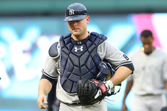 ARLINGTON, TX - APRIL 26: Brian McCann #34 of the New York Yankees walks to the dugout before the start of the game against Texas Rangers at Global Life Park in Arlington on April 26, 2015 in Arlington, Texas. (Photo by Rick Yeatts/Getty Images)