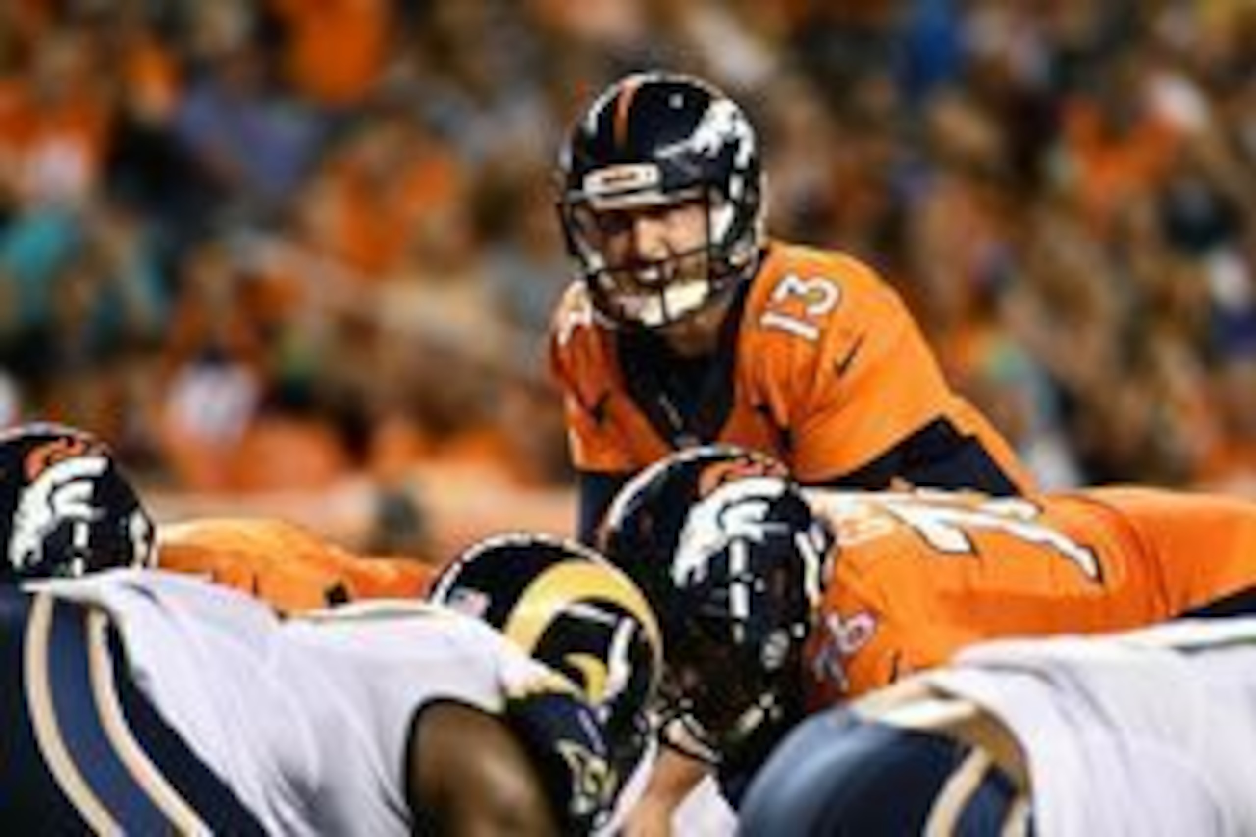 Aug 27, 2016; Denver, CO, USA; Denver Broncos quarterback Trevor Siemian (13) calls out from the line of scrimmage during the second quarter of a preseason game against the Los Angeles Rams at Sports Authority Field at Mile High. Mandatory Credit: Ron Che