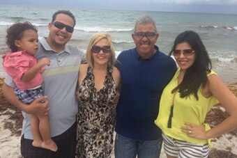 Salazar and his wife recently welcomed their first grandchild, Xavier, to the family courtesy of Franklin Gutierrez and Salazar's daughter Viviana (far right).
