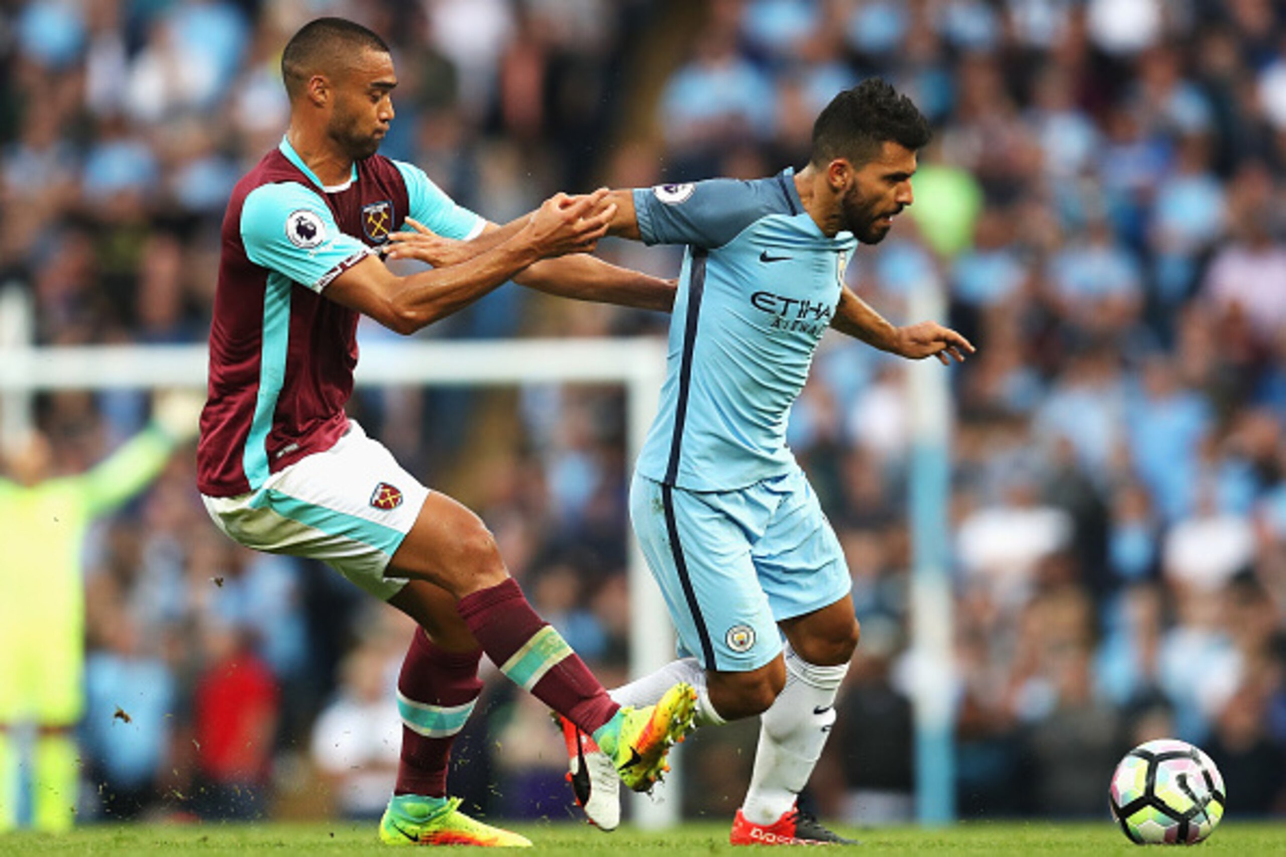 MANCHESTER, ENGLAND - AUGUST 28:  Sergio Aguero of Manchester City is challenged by Winston Reid of West Ham United during the Premier League match between Manchester City and West Ham United at Etihad Stadium on August 28, 2016 in Manchester, England.  (