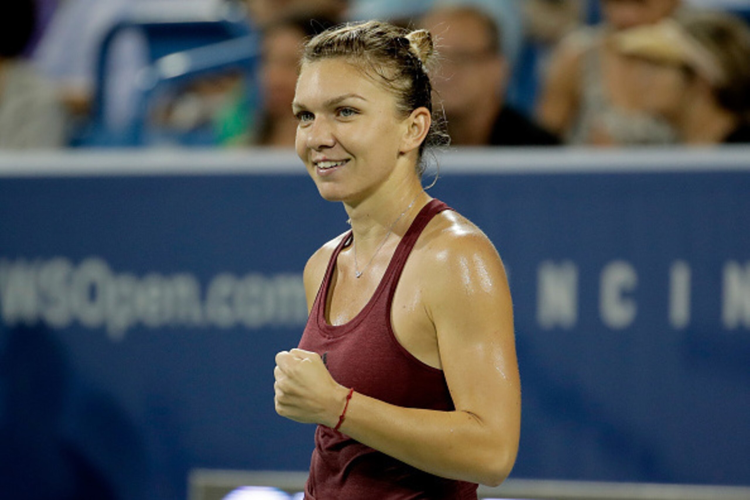 MASON, OH - AUGUST 19: Simona Halep of Romania celebrates after winning her quarterfinal match against Agnieszka Radwanska during day 7 of the Western & Southern Open at the Lindner Family Tennis Center on August 19, 2016 in Mason, Ohio. (Photo by Andy MASON, OH - AUGUST 19: Simona Halep of Romania celebrates after winning her quarterfinal match against Agnieszka Radwanska during day 7 of the Western & Southern Open at the Lindner Family Tennis Center on August 19, 2016 in Mason, Ohio. (Photo by Andy