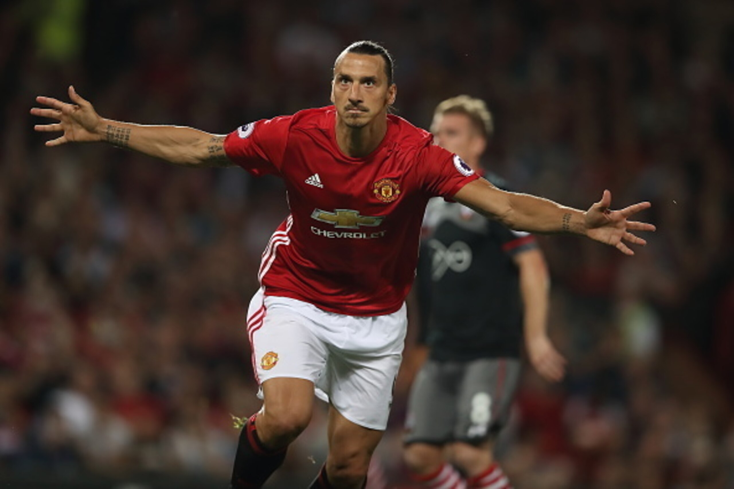 MANCHESTER, ENGLAND - AUGUST 19: Zlatan Ibrahimovic of Manchester United celebrates after scoring a goal to make it 2-0 during the Premier League match between Manchester United and  Southampton at Old Trafford on August 19, 2016 in Manchester, England. (