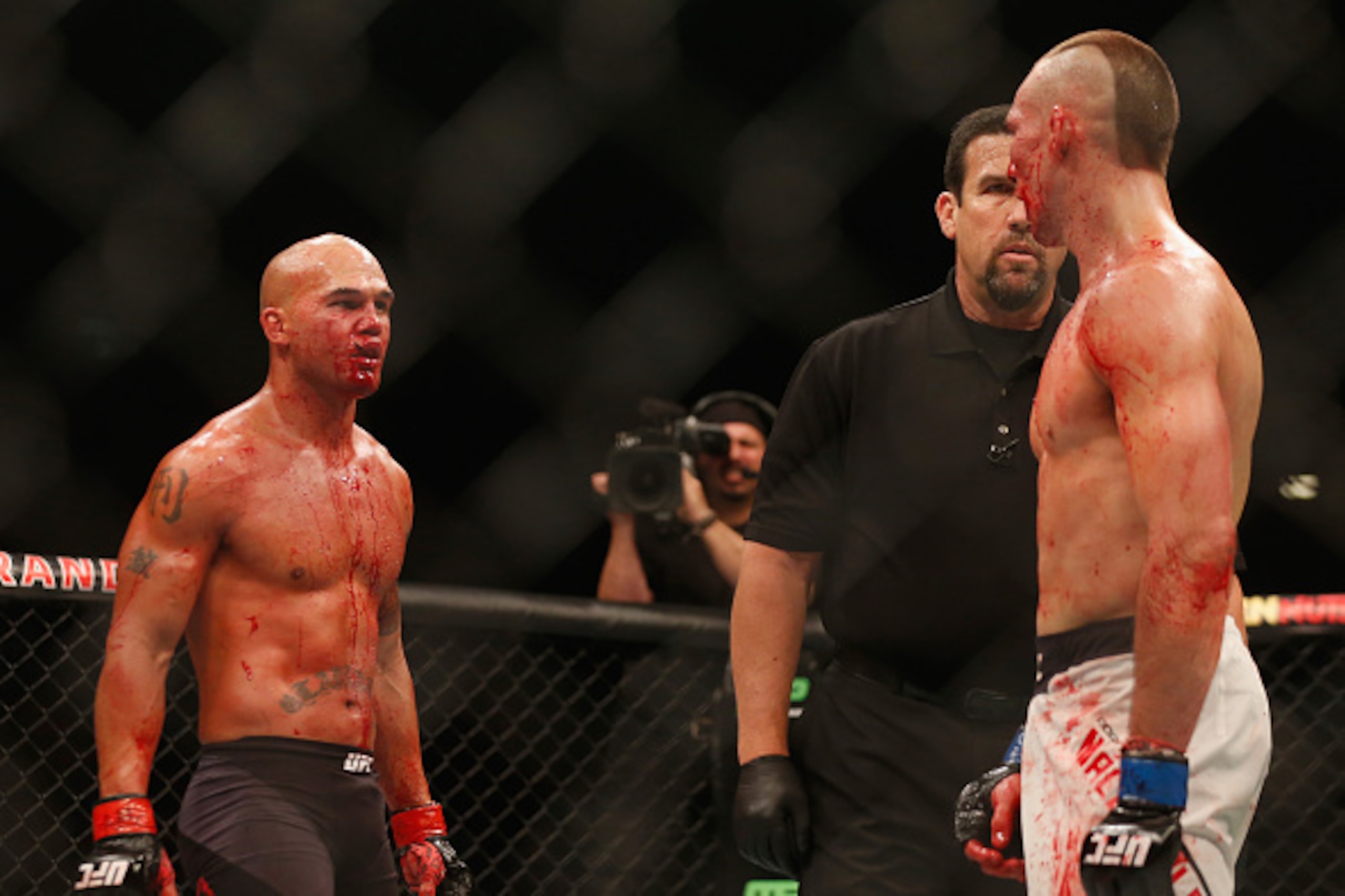 LAS VEGAS, NV - JULY 11:  (L-R) Robbie Lawler and Rory MacDonald exchange words in their UFC welterweight title fight during the UFC 189 event inside MGM Grand Garden Arena on July 11, 2015 in Las Vegas, Nevada.  (Photo by Christian Petersen/Zuffa LLC/Zuf