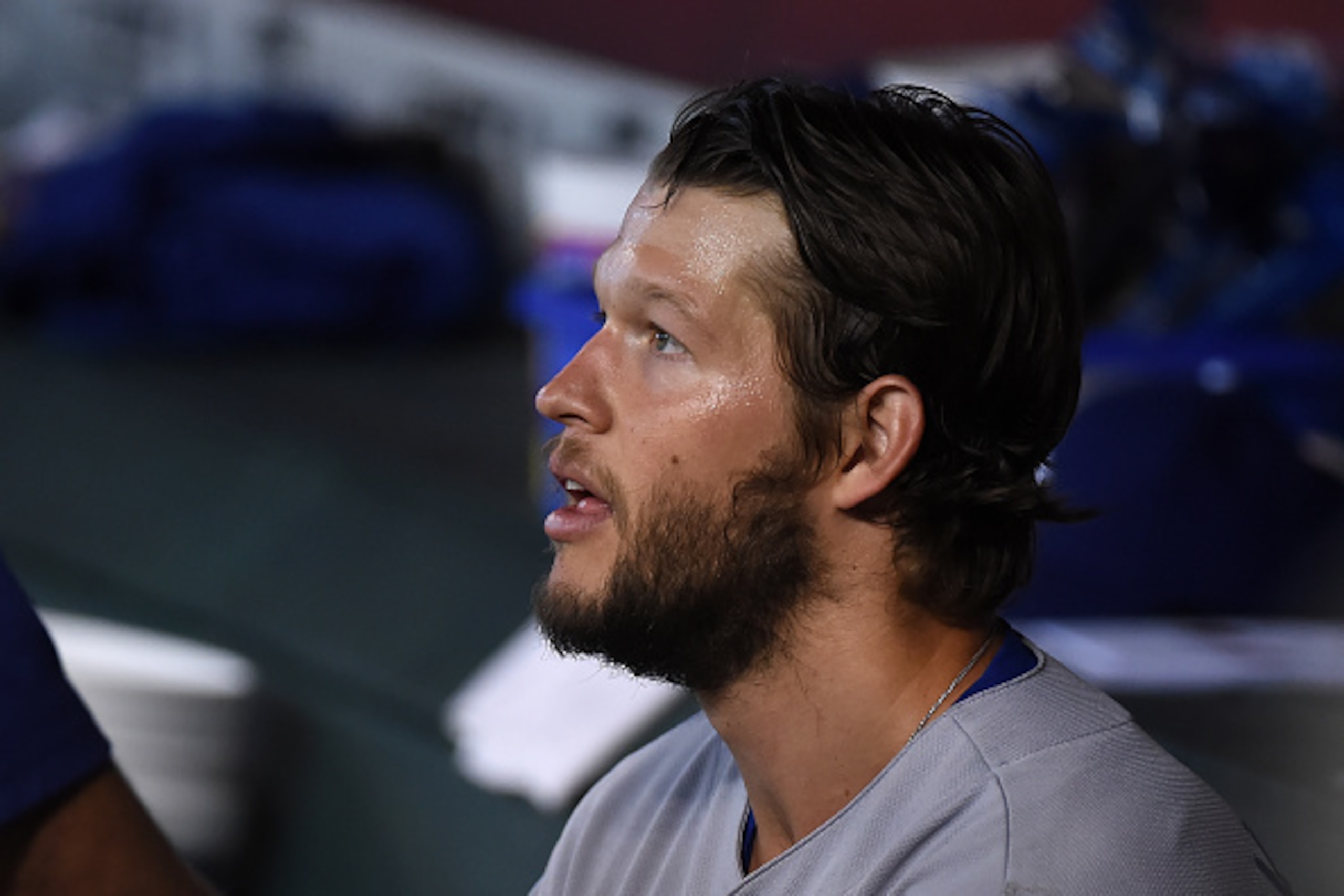 PHOENIX, AZ - JUNE 15:  Clayton Kershaw #22 of the Los Angeles Dodgers watches from the bench after being replaced during the eighth inning against the Arizona Diamondbacks at Chase Field on June 15, 2016 in Phoenix, Arizona. Dodgers won 3-2. (Photo by No