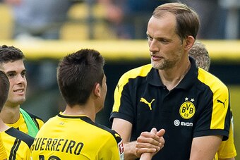 Dortmund, Germany 27.07.2016, 1.Bundesliga 1. Spieltag, BV Borussia Dortmund - 1. FSV Mainz 05, 2:1, Raphael Guerreiro (BVB) und Trainer Thomas Tuchel (BVB)   (Photo by TF-Images/Getty Images)
