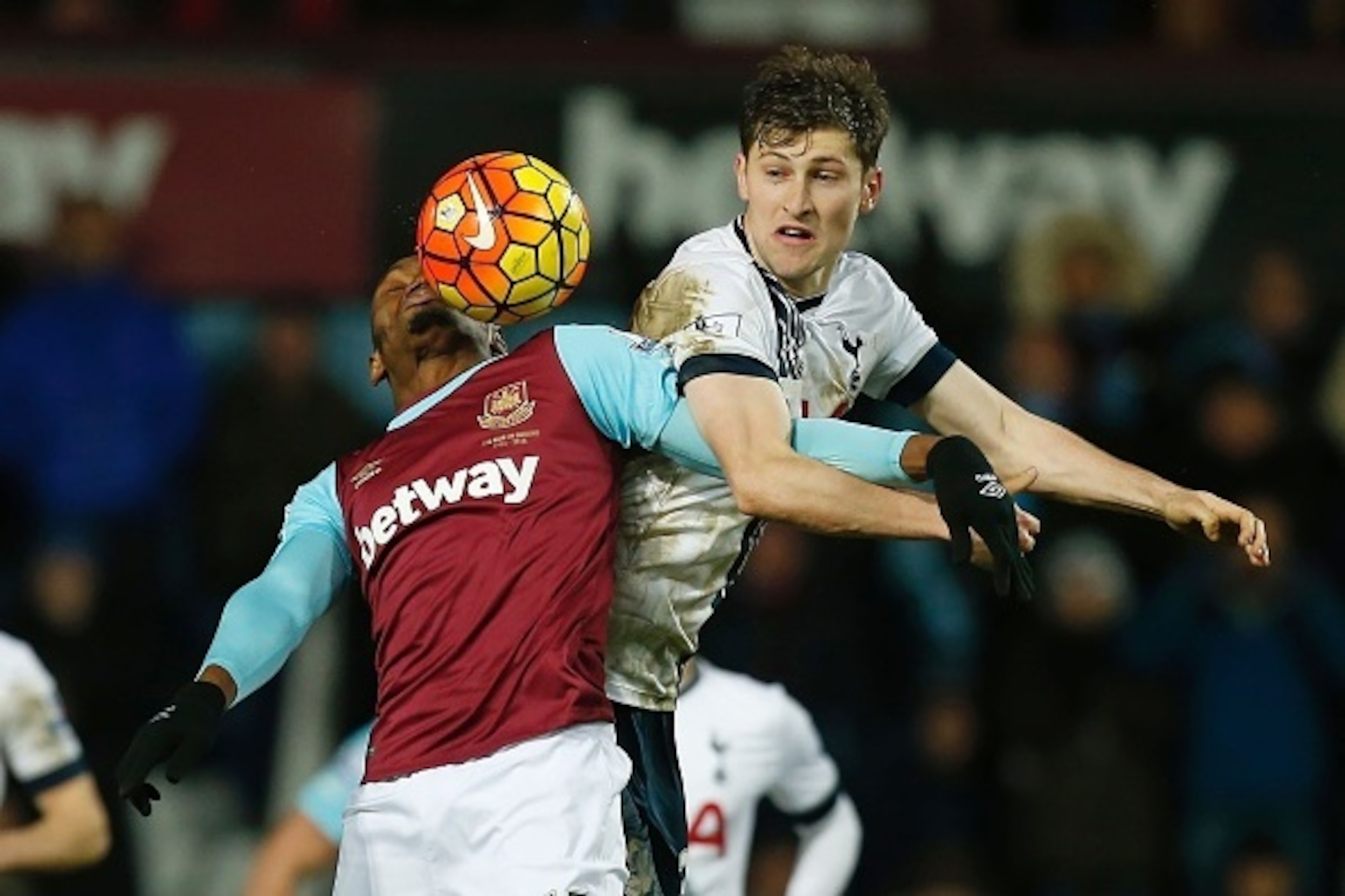 West Ham United's Senegalese striker Diafra Sakho vies with Tottenham Hotspur's Welsh defender Ben Davies (R) during the English Premier League football match between West Ham United and Tottenham Hotpsur at The Boleyn Ground in Upton Park, in east London