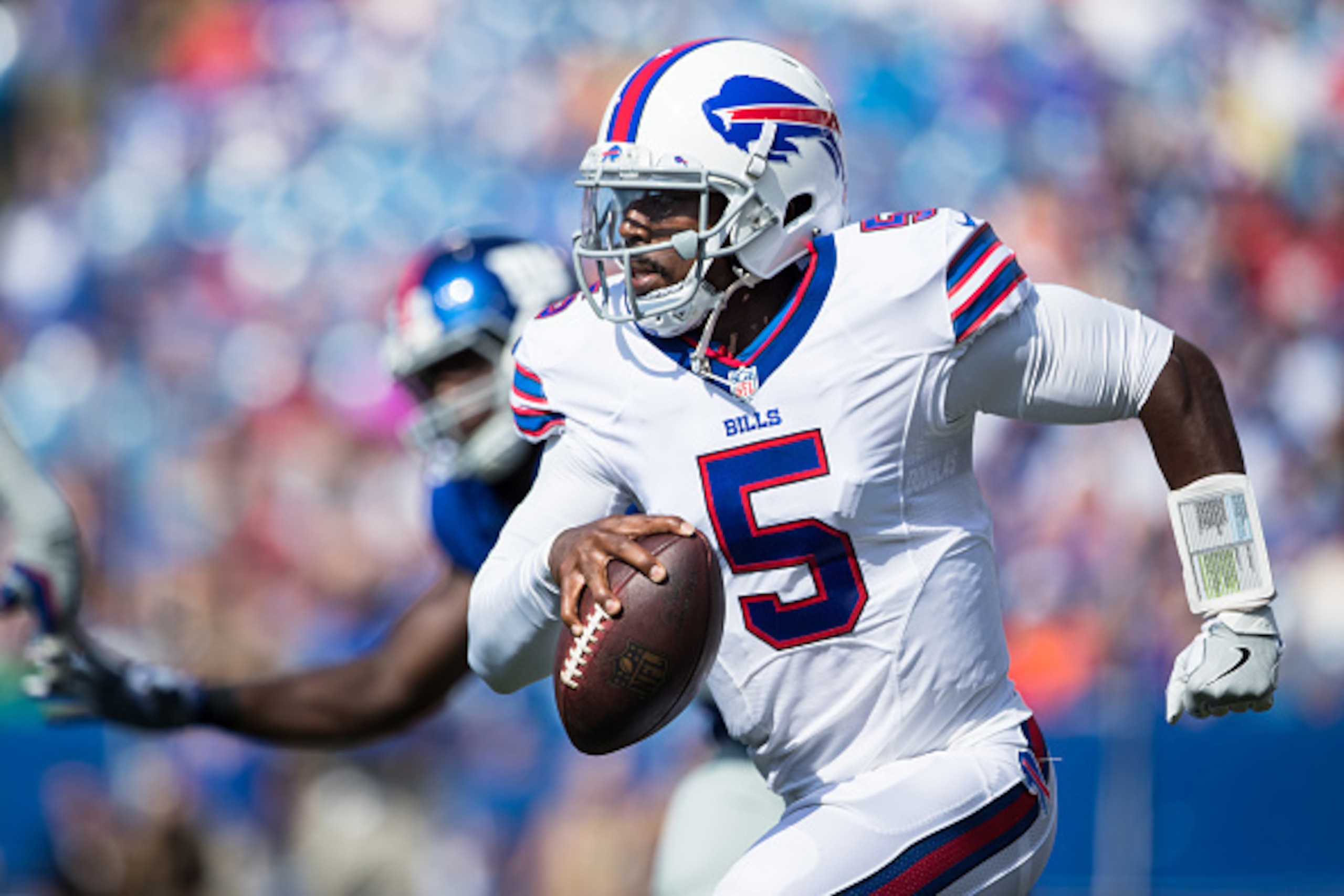 ORCHARD PARK, NY - AUGUST 20:  Tyrod Taylor #5 of the Buffalo Bills scrambles with the ball during the first quarter against the New York Giants on August 20, 2016 at New Era Field in Orchard Park, New York.  (Photo by Brett Carlsen/Getty Images)