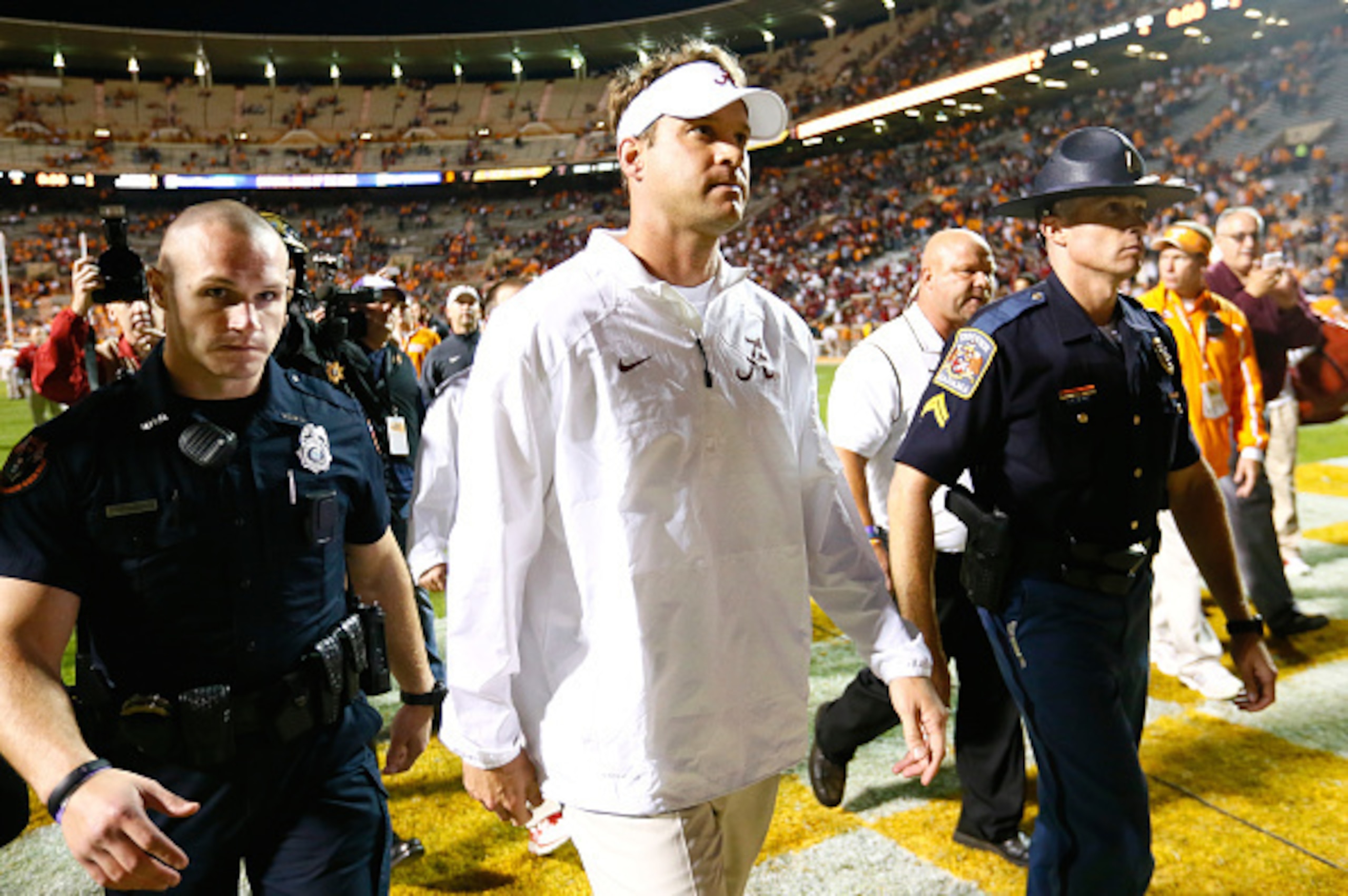 KNOXVILLE, TN - OCTOBER 25:  Offensive coordinator Lane Kiffin of the Alabama Crimson Tide walks off the field after their 34-20 win over the Tennessee Volunteers at Neyland Stadium on October 25, 2014 in Knoxville, Tennessee.  (Photo by Kevin C. Cox/Gett