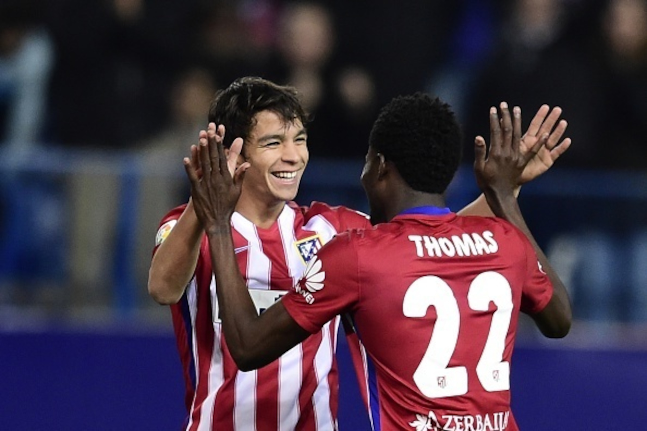 Atletico Madrid's Ghanaian midfielder Thomas Partey (R) celebrates a goal with Atletico Madrid's midfielder Oliver Torres during the Spanish Copa del Rey (King's Cup) football match Club Atletico de Madrid VS CF Reus Deportivo at the Vicente Calderon stad