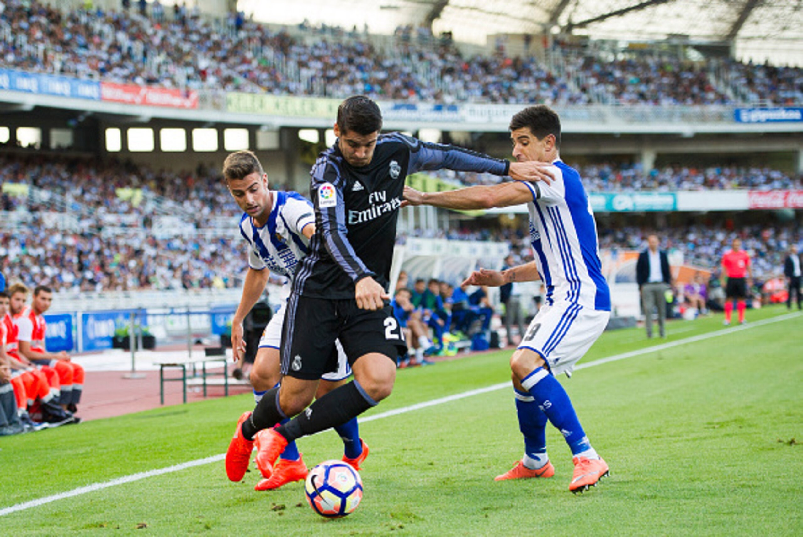 SAN SEBASTIAN, SPAIN - AUGUST 21:  Alvaro Morata of Real Madrid duels for the ball with Yuri Berchiche of Real Sociedad during the La Liga match between Real Sociedad de Futbol and Real Madrid at Estadio Anoeta on August 21, 2016 in San Sebastian, Spain. 
