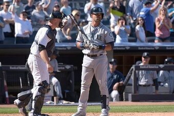 McCann greets Gutierrez at the plate in an April 2016 game in New York.