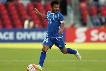 TORONTO, ON - JULY 14:  Andres Flores #14 of El Salvador during the 2015 CONCACAF Gold Cup Group B match between Jamaica and El Salvador at BMO Field on July 14, 2015 in Toronto, Ontario, Canada.  (Photo by Vaughn Ridley/Getty Images)