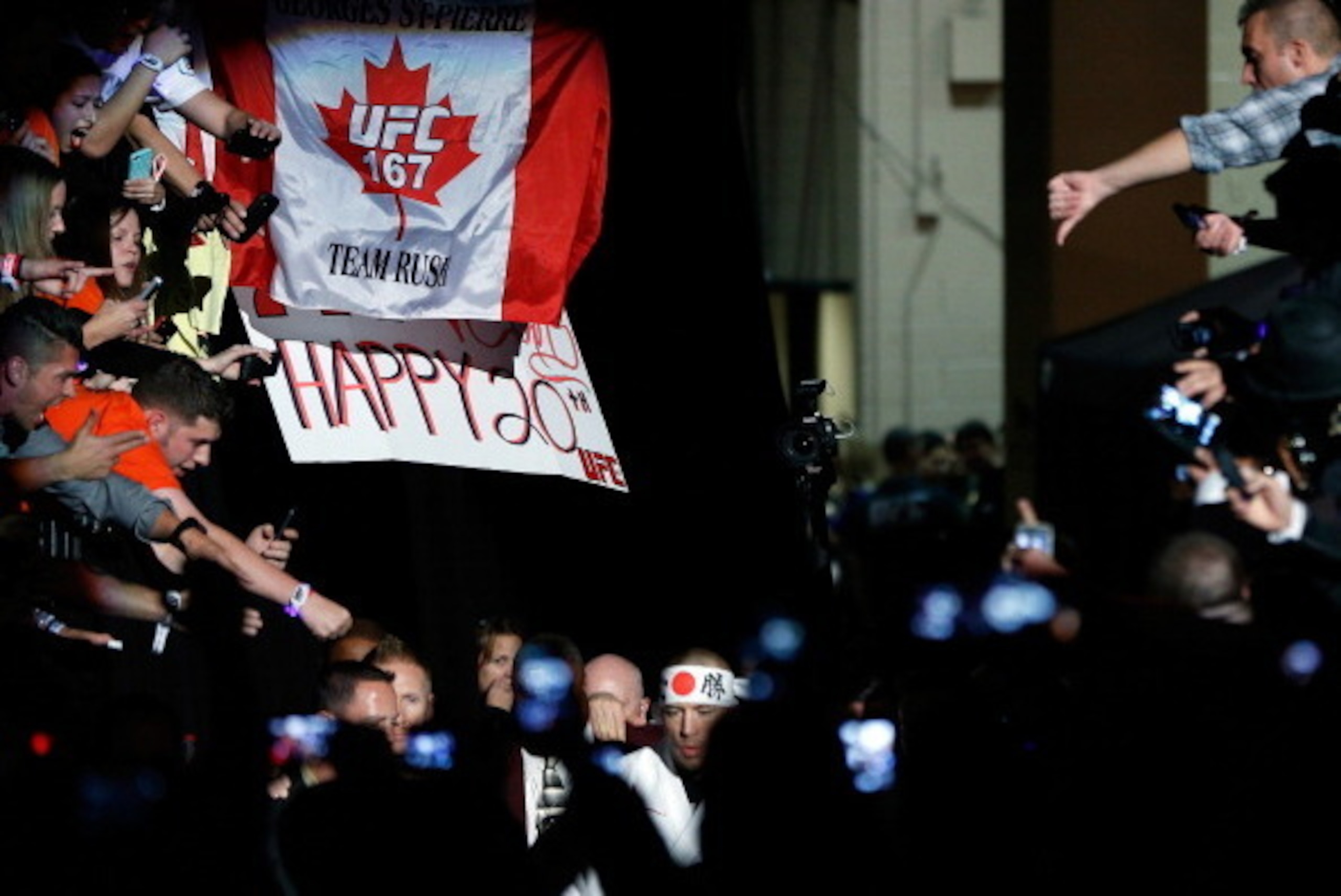 LAS VEGAS, NV - NOVEMBER 16:  Georges St-Pierre enters the arena before his UFC welterweight championship bout against Johny Hendricks during the UFC 167 event inside the MGM Grand Garden Arena on November 16, 2013 in Las Vegas, Nevada. (Photo by Josh Hed