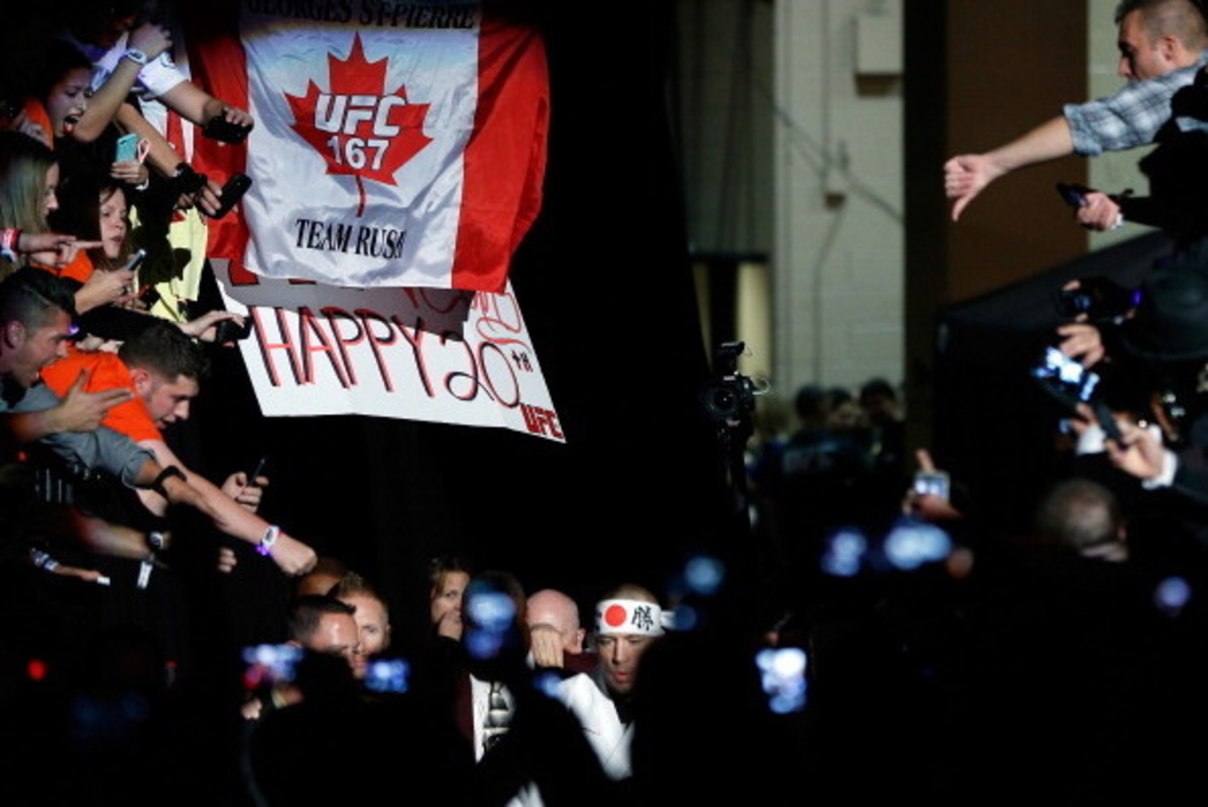 LAS VEGAS, NV - NOVEMBER 16:  Georges St-Pierre enters the arena before his UFC welterweight championship bout against Johny Hendricks during the UFC 167 event inside the MGM Grand Garden Arena on November 16, 2013 in Las Vegas, Nevada. (Photo by Josh Hed