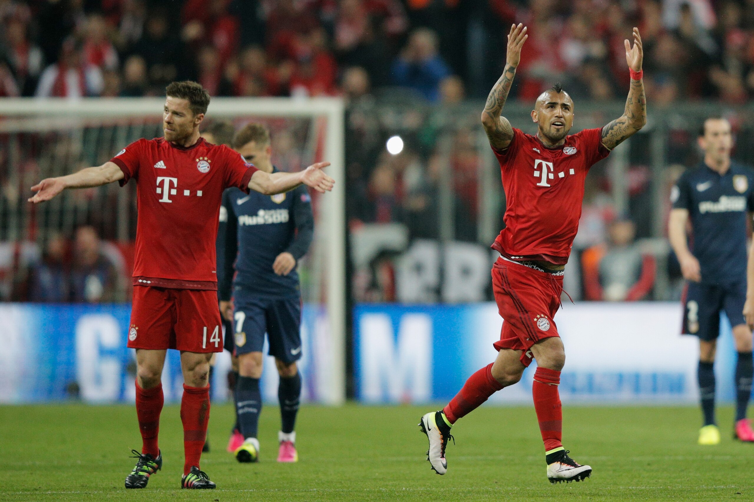Alonso (left) and Vidal (right) helped Bayern to the Champions League semi-finals last season.