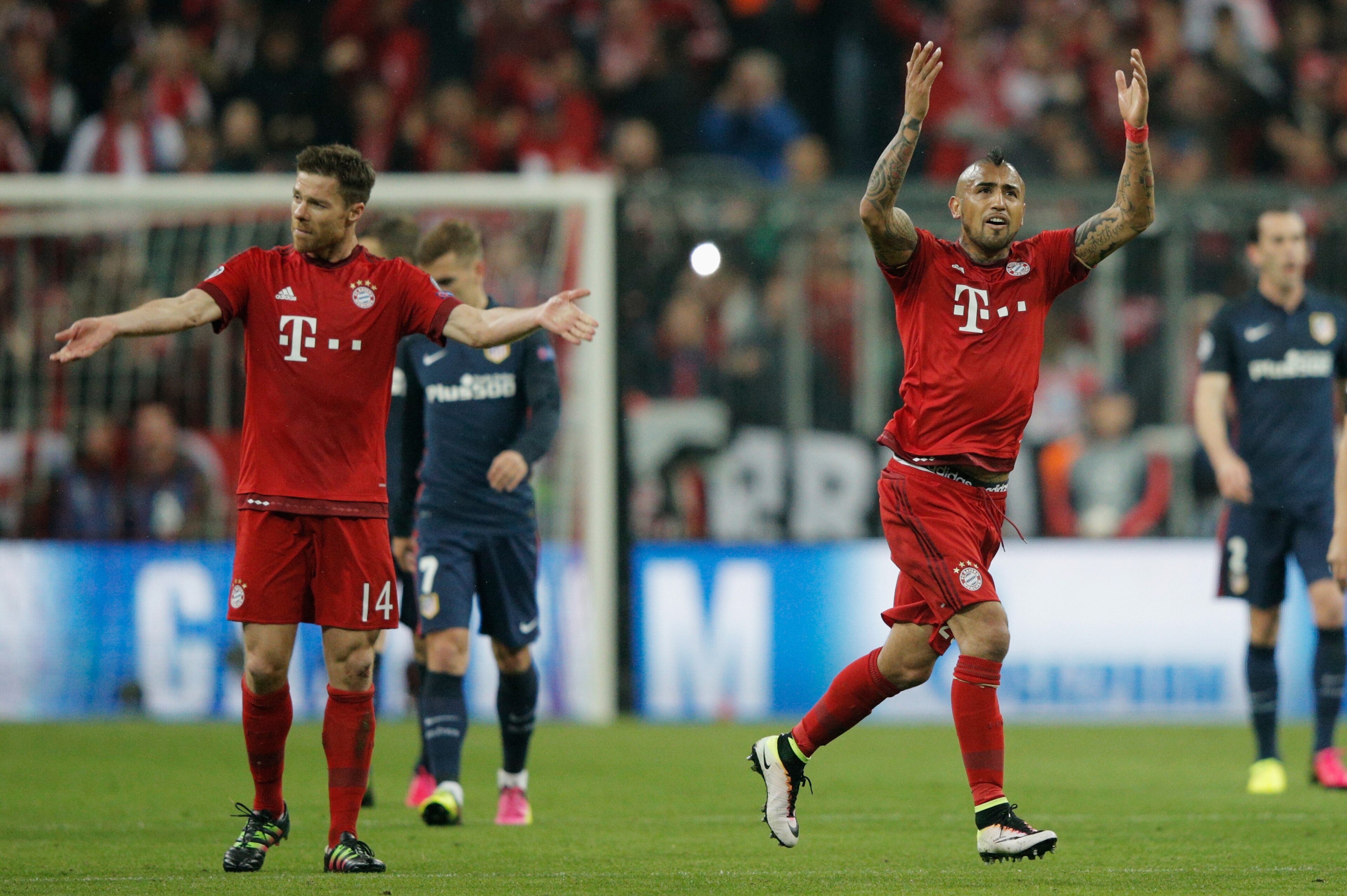 Alonso (left) and Vidal (right) helped Bayern to the Champions League semi-finals last season.